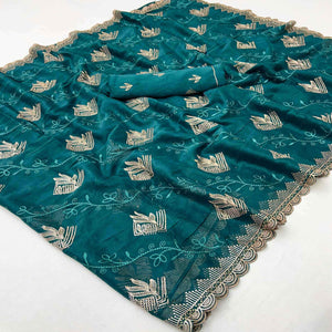 Elegant Teal Georgette Saree Accented With Intricate Floral Thread Embroidery
