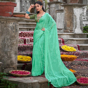 Turquoise Woven With Swarovski Work Brasso Saree