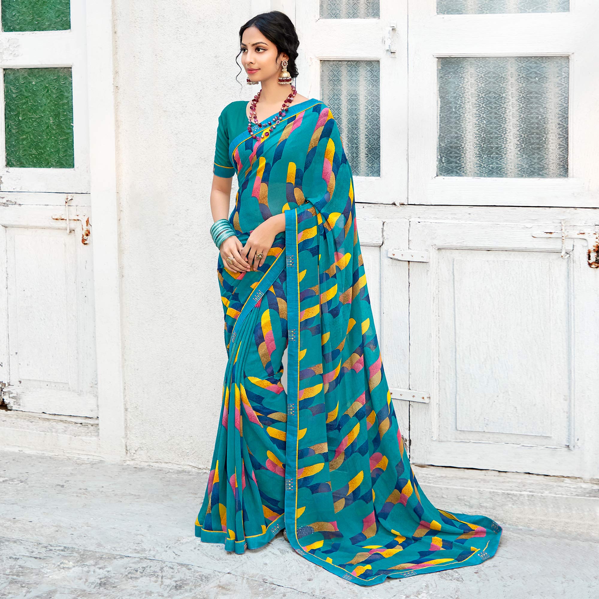 Blue Geometric Printed Georgette Saree With Lace Border