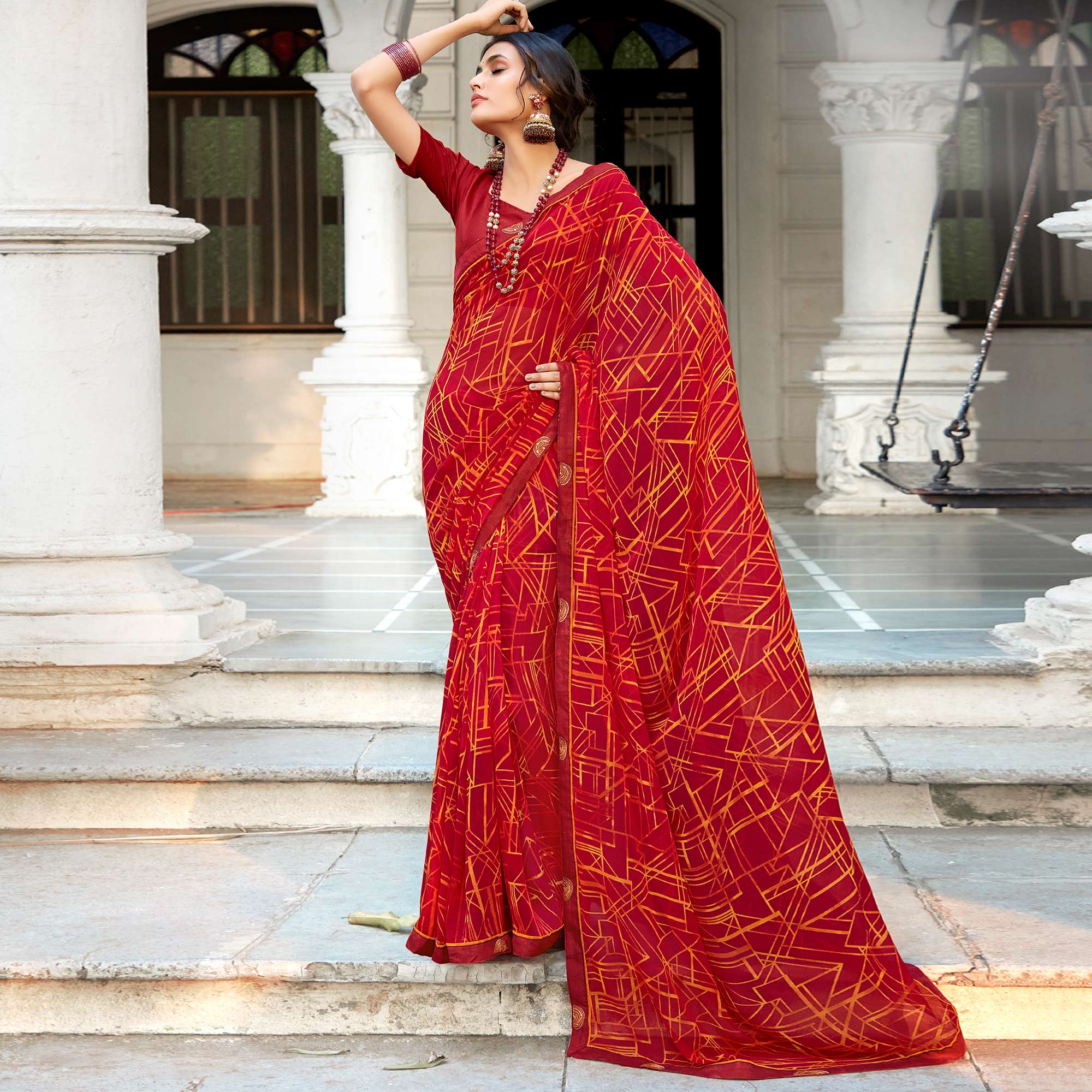 Red Geometric Printed Georgette Saree With Lace Border