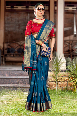 Blue Dola Silk Saree Featuring Artistic Print Work & Graceful Tassel Edging