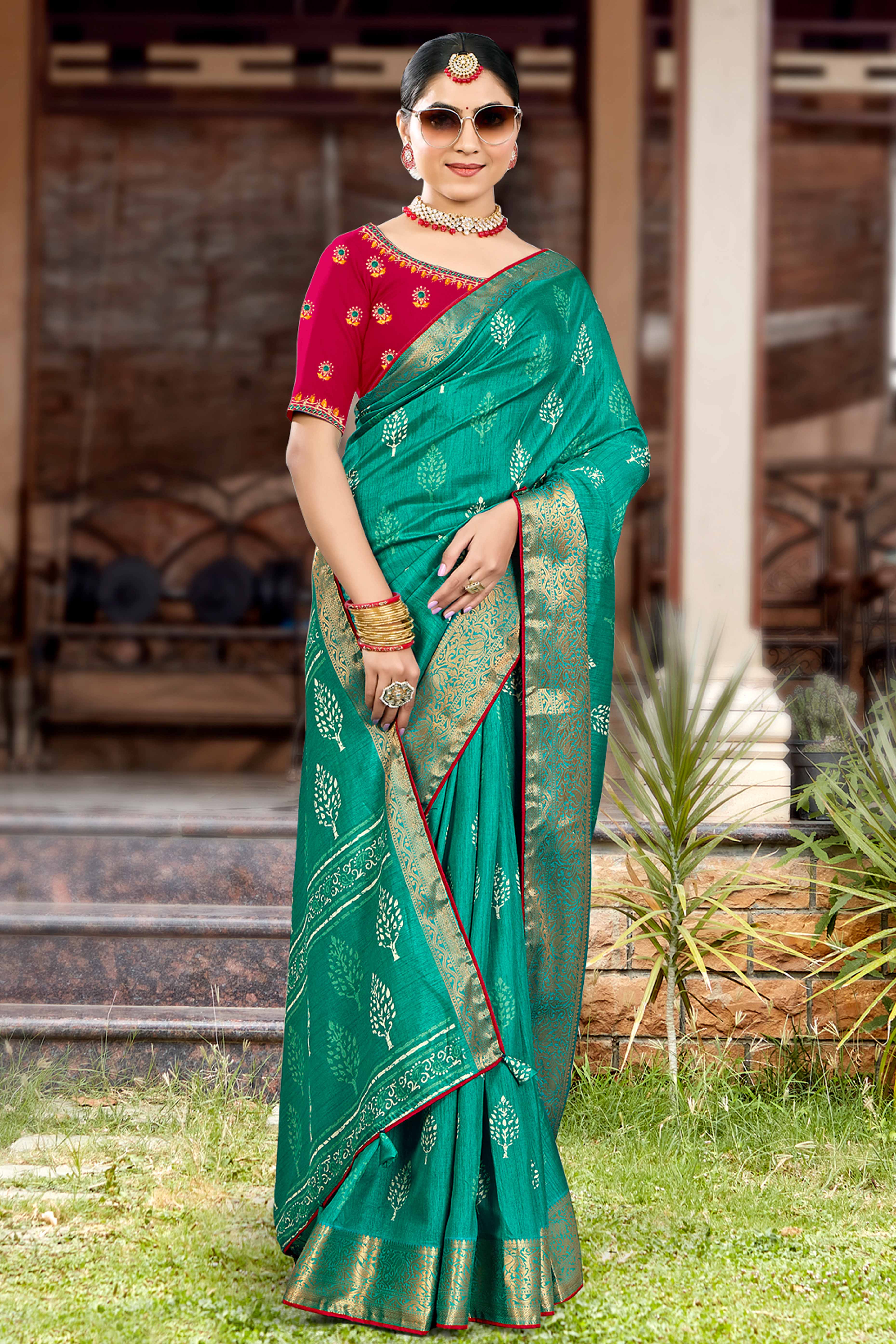 Rama Green Dola Silk Saree Featuring Artistic Print Work & Graceful Tassel Edging