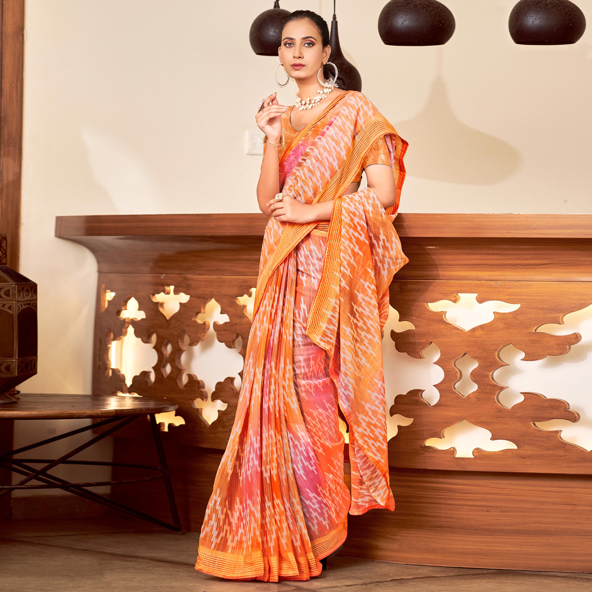 Orange Ikkat Printed Chiffon Saree