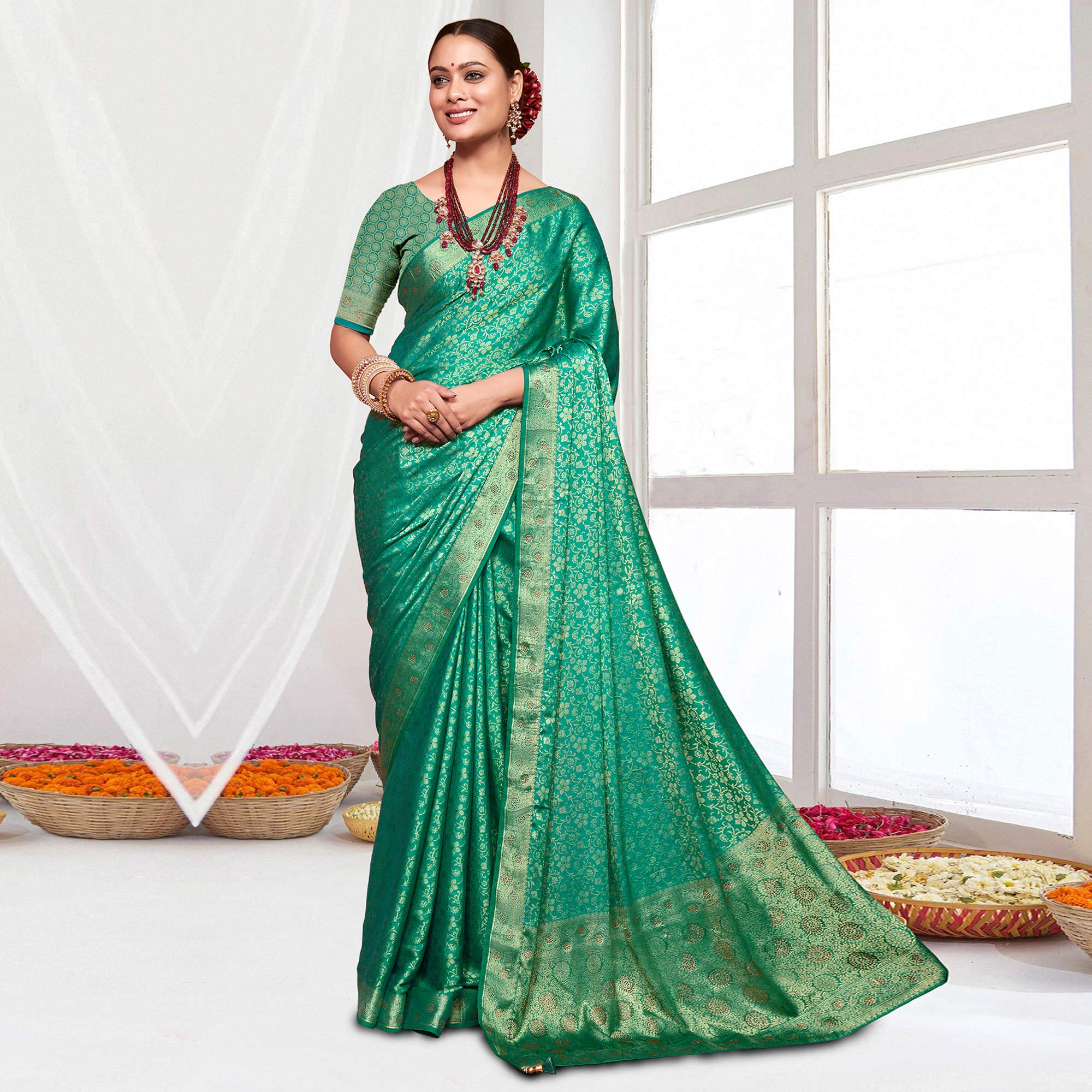 Rama Green Floral Zari Work Pure Silk Saree With Tassels