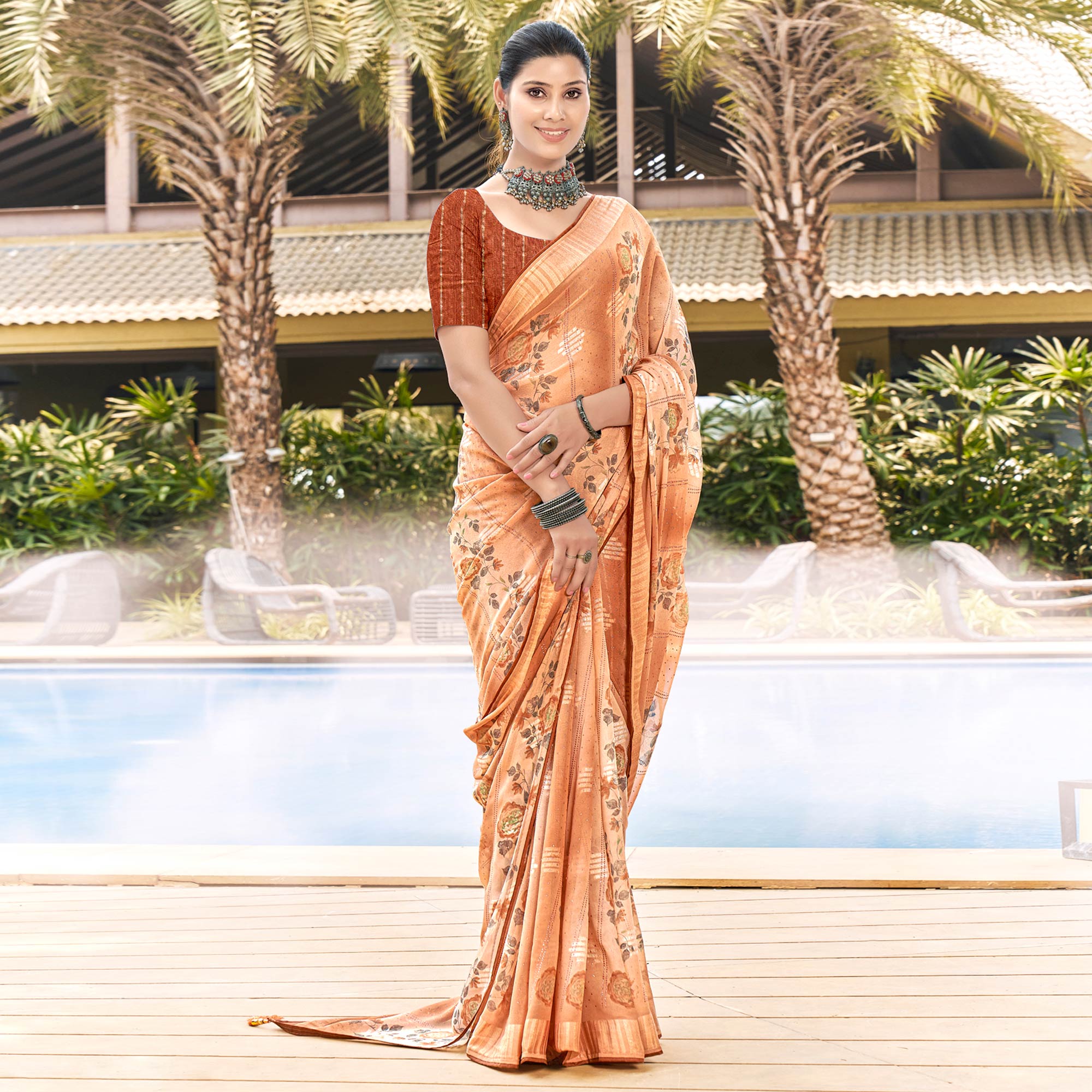 Rust Printed Georgette Saree With Swarovski Work