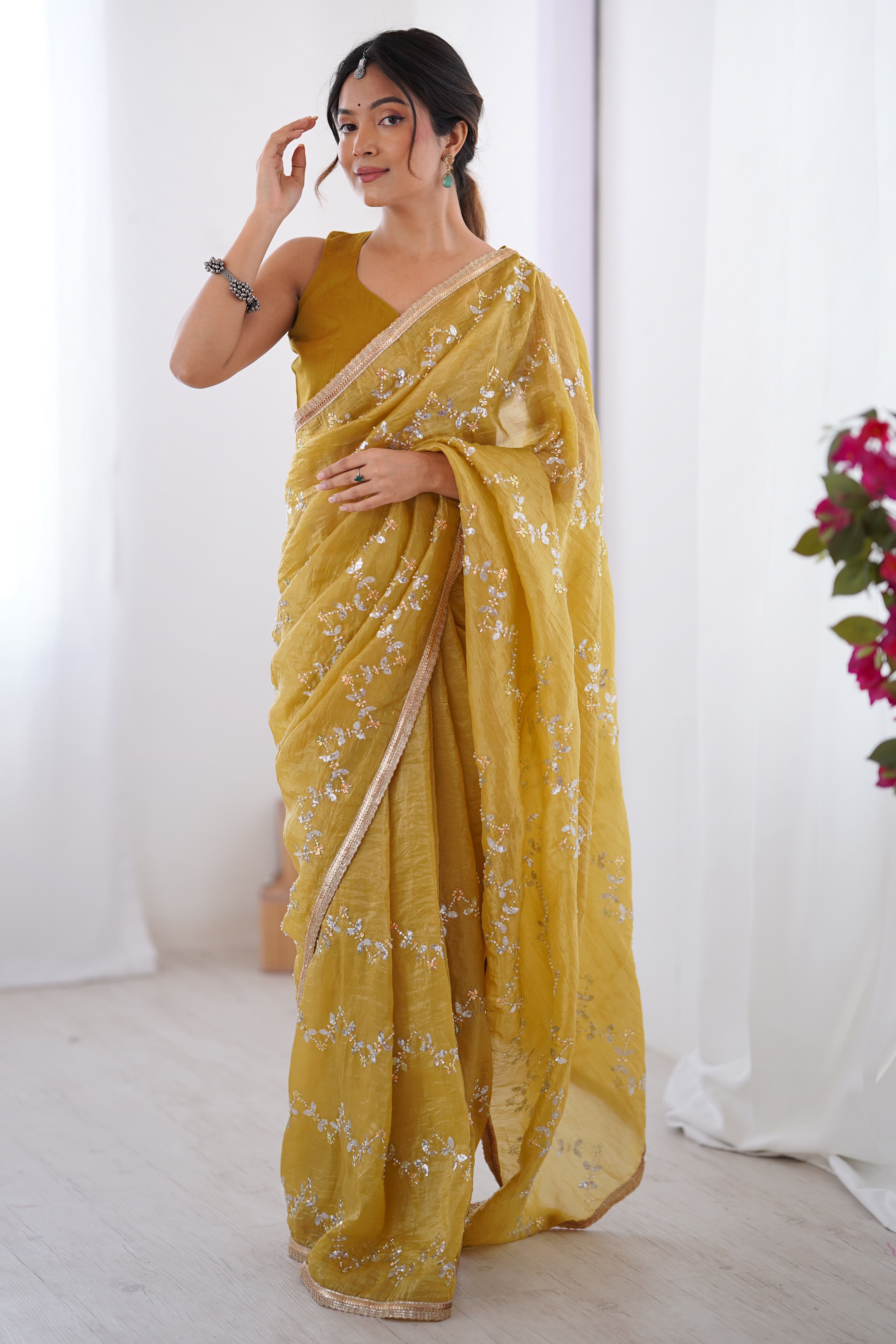 Dazzling Mustard Yellow Organza Saree Accented with Sequin, Bead & Stone Work and Delicate Lace Detailing
