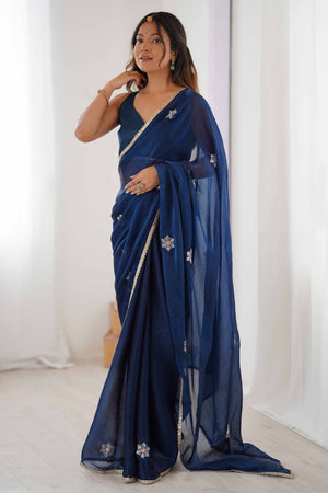 Blue Organza Saree Embellished with Intricate Floral Work and Elegant Lace Detailing