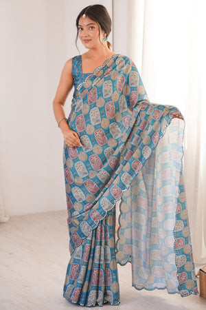 Timeless Teal Blue Floral Digital Printed Chinon Saree Enhanced With Fine Embroidered Border