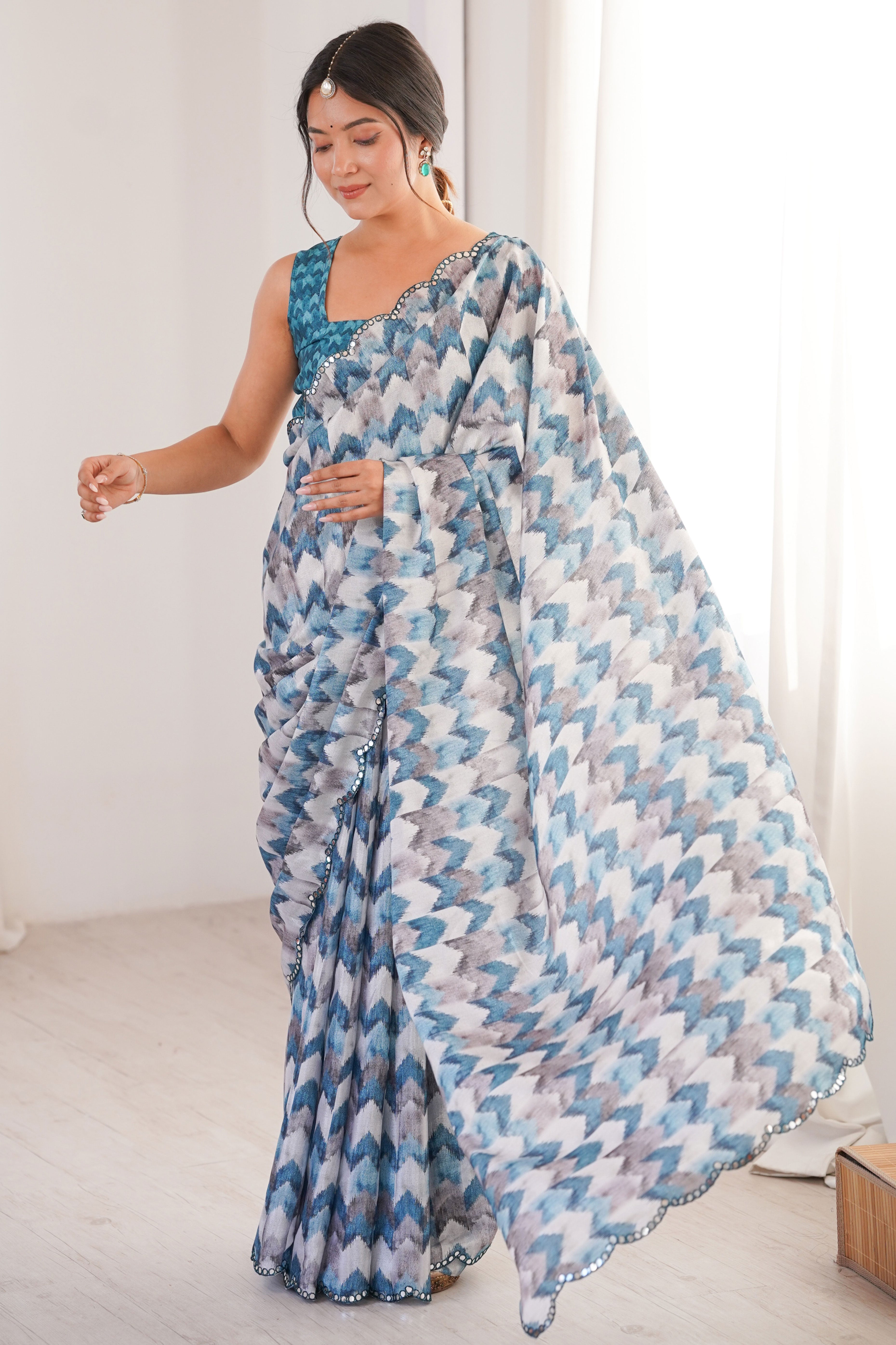 Elegant White Floral Digital Printed Chinon Saree Accented With Intricate Embroidered Border