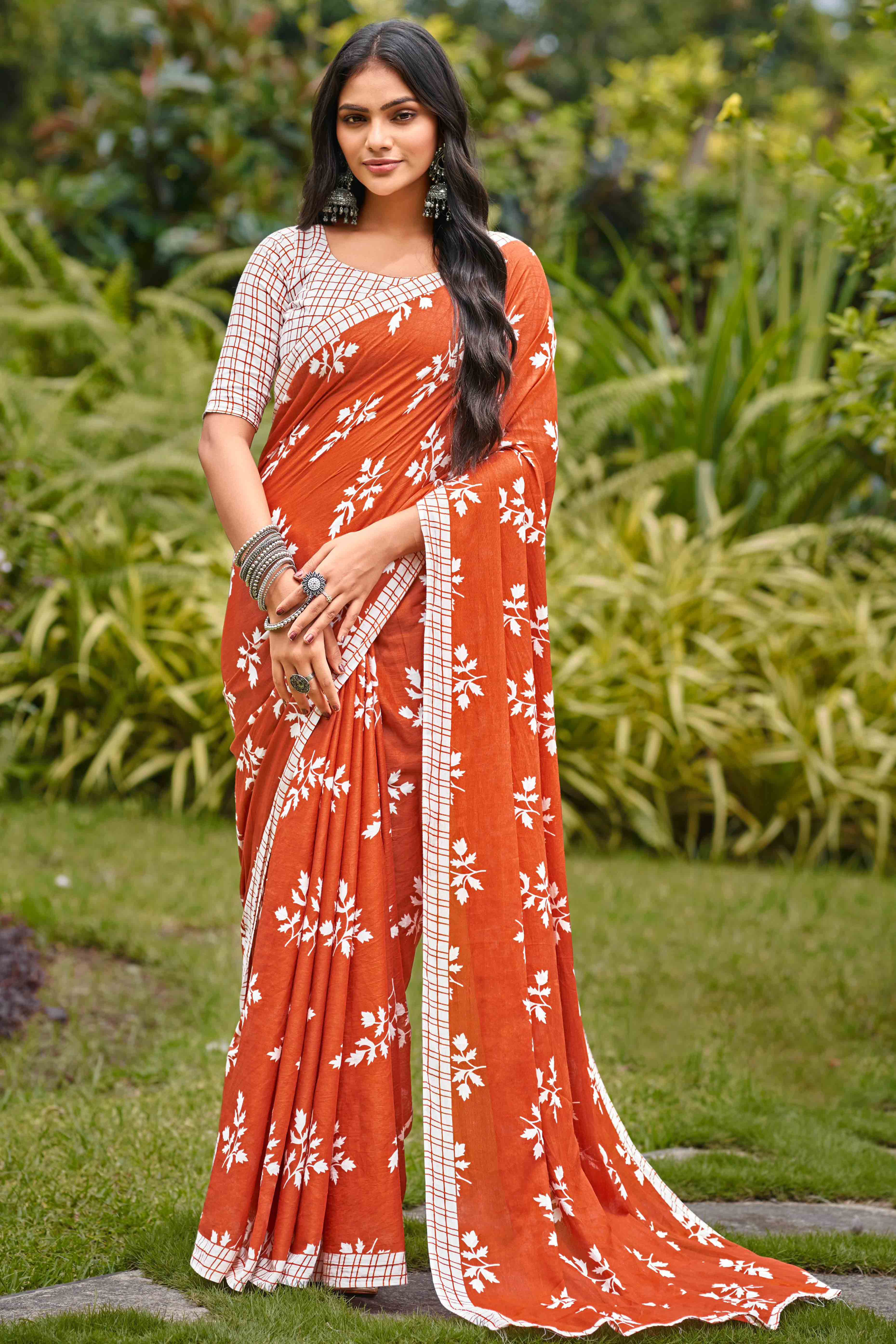 Rust Orange Pure Cotton Saree with Delicate Floral Patterns