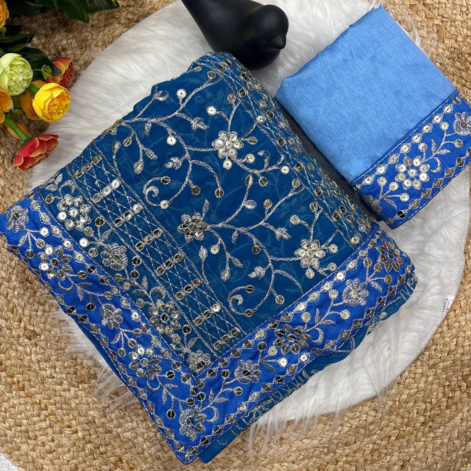 Beautiful Sky Blue Partywear Saree Crafted in Georgette with Sequins and Thread Work