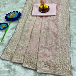 Lustrous Pink Organza Silk Saree Beautified With Paisley Embroidery & Glittering Sequins Work