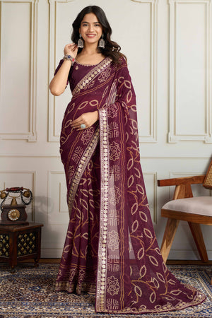 Wine Bandhani Digital Printed Georgette Saree Enhanced With Cording Embroidered Border