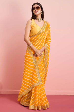 Elegant Yellow Leheriya Printed Saree in Flowing Georgette
