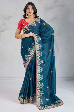 Teal Embroidered Saree with Ethnic Detailing in Georgette Fabric