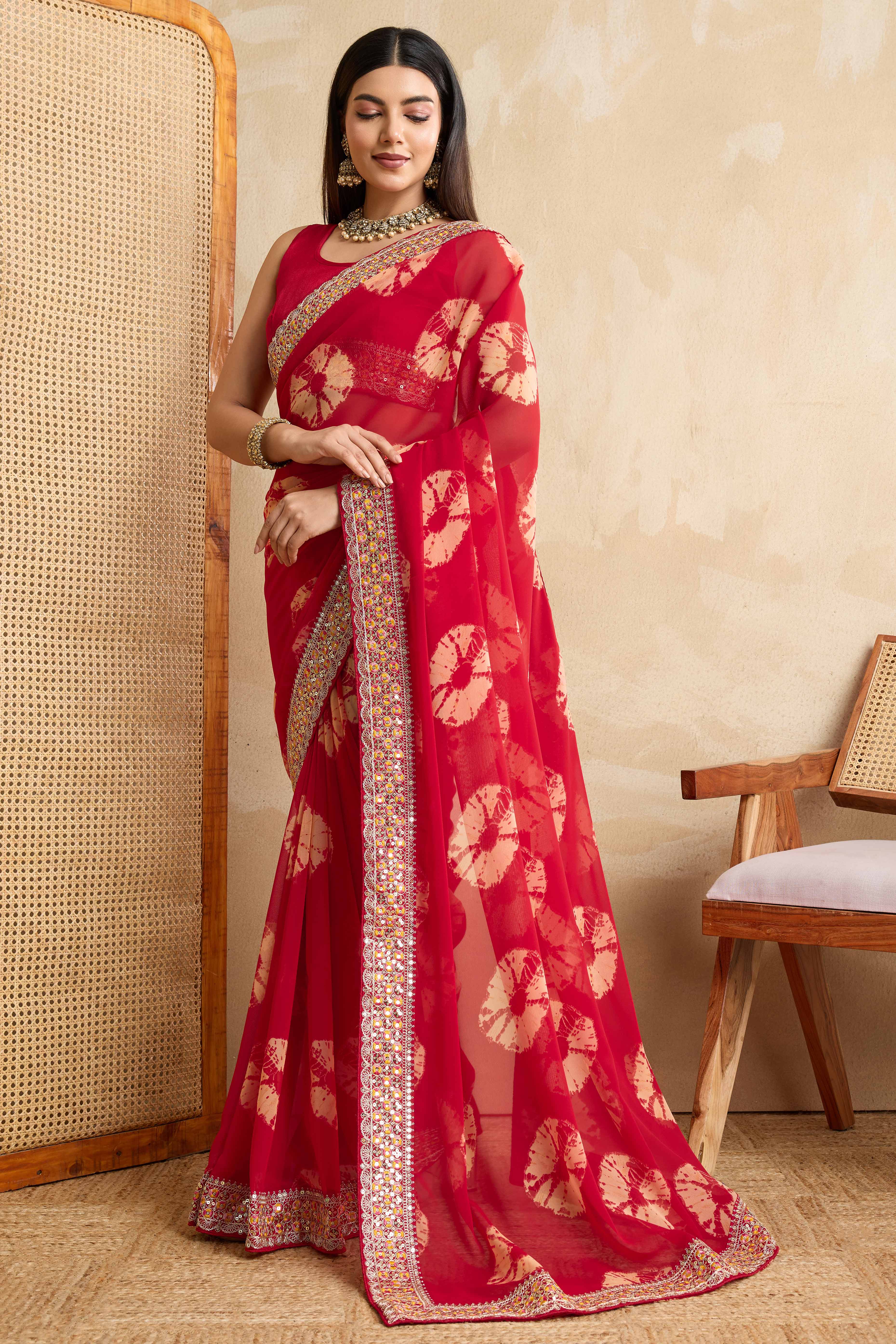 Red Georgette Saree with Contemporary Tie-Dye Patterns and Classic Lace Work Finish