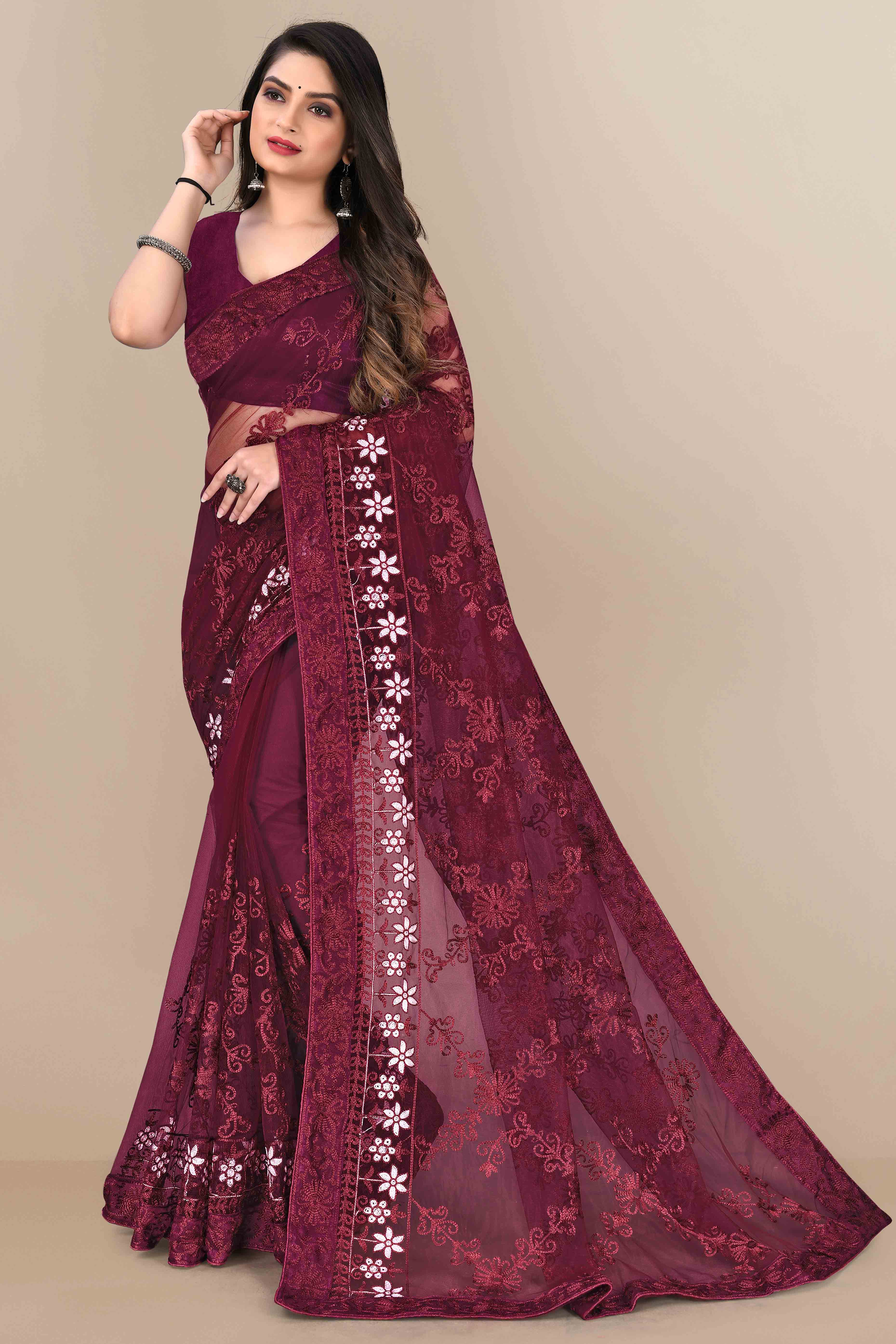 Wine Party Wear Net Saree Featuring Rich Floral Embroidery