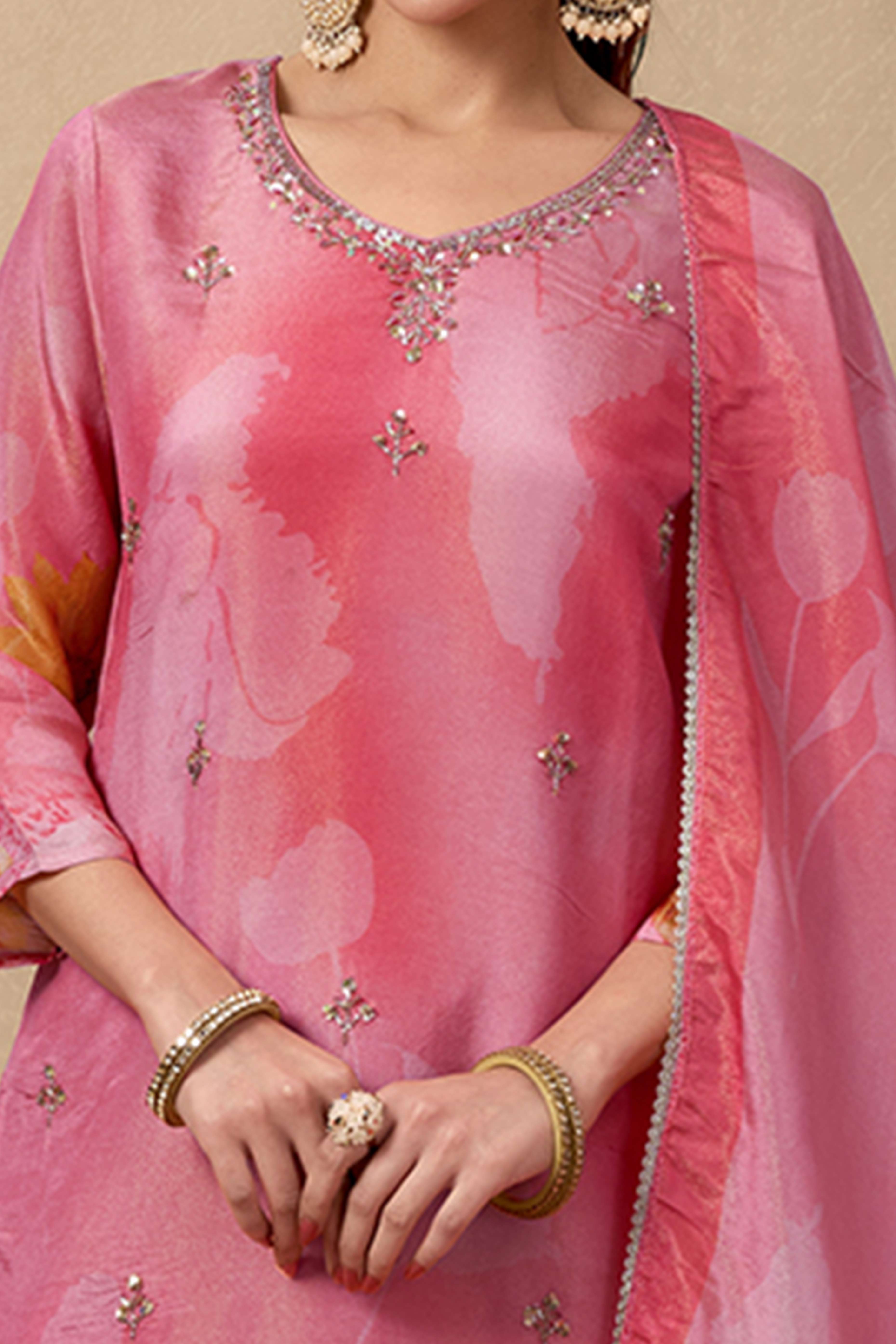 Bright Peach Organza Straight Suit Enhanced with Detailed Embroidery in Stones and Beads
