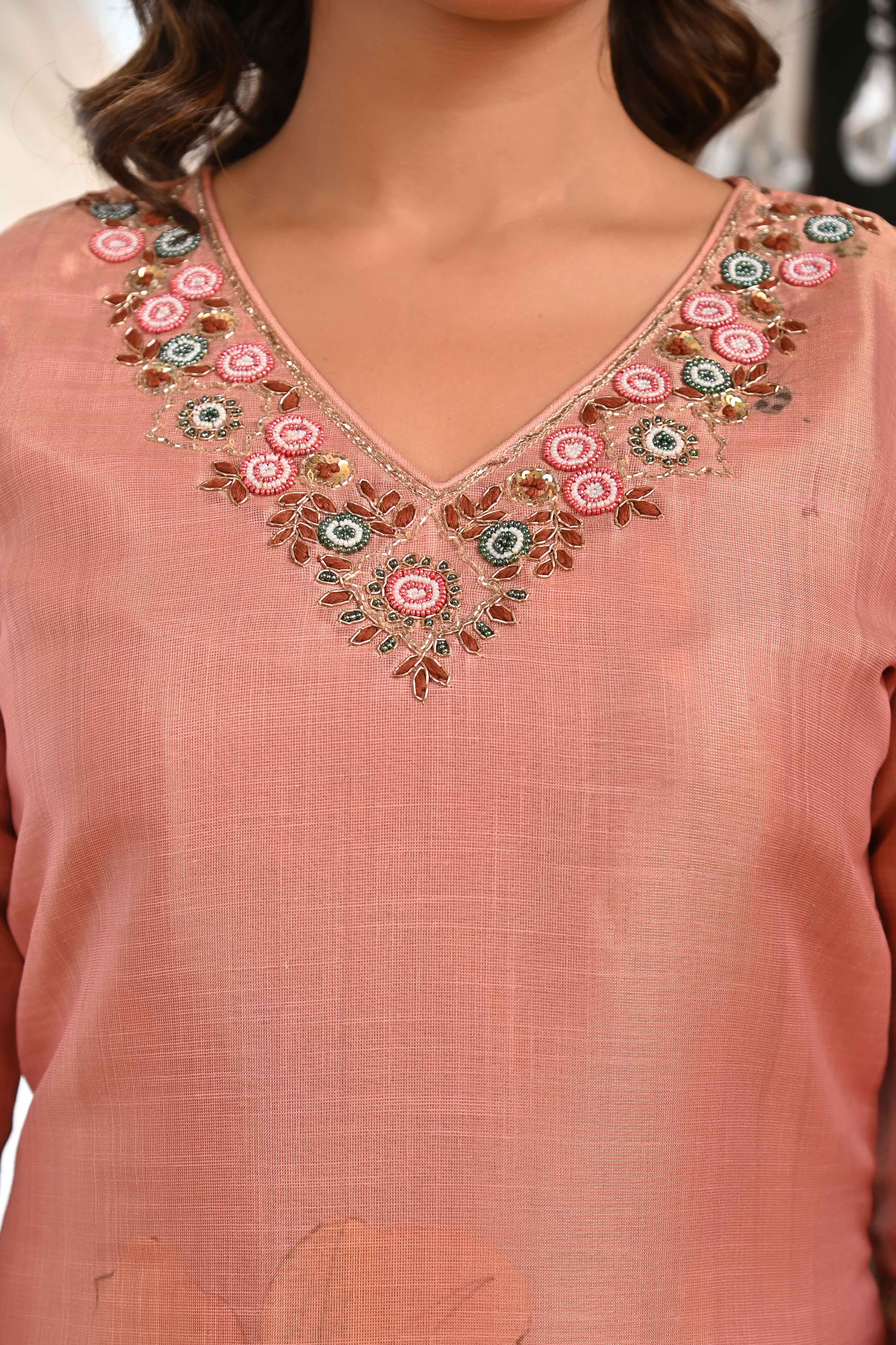 Elegant Dark Peach Linen Jacquard Salwar Suit with Floral Prints & Shimmer