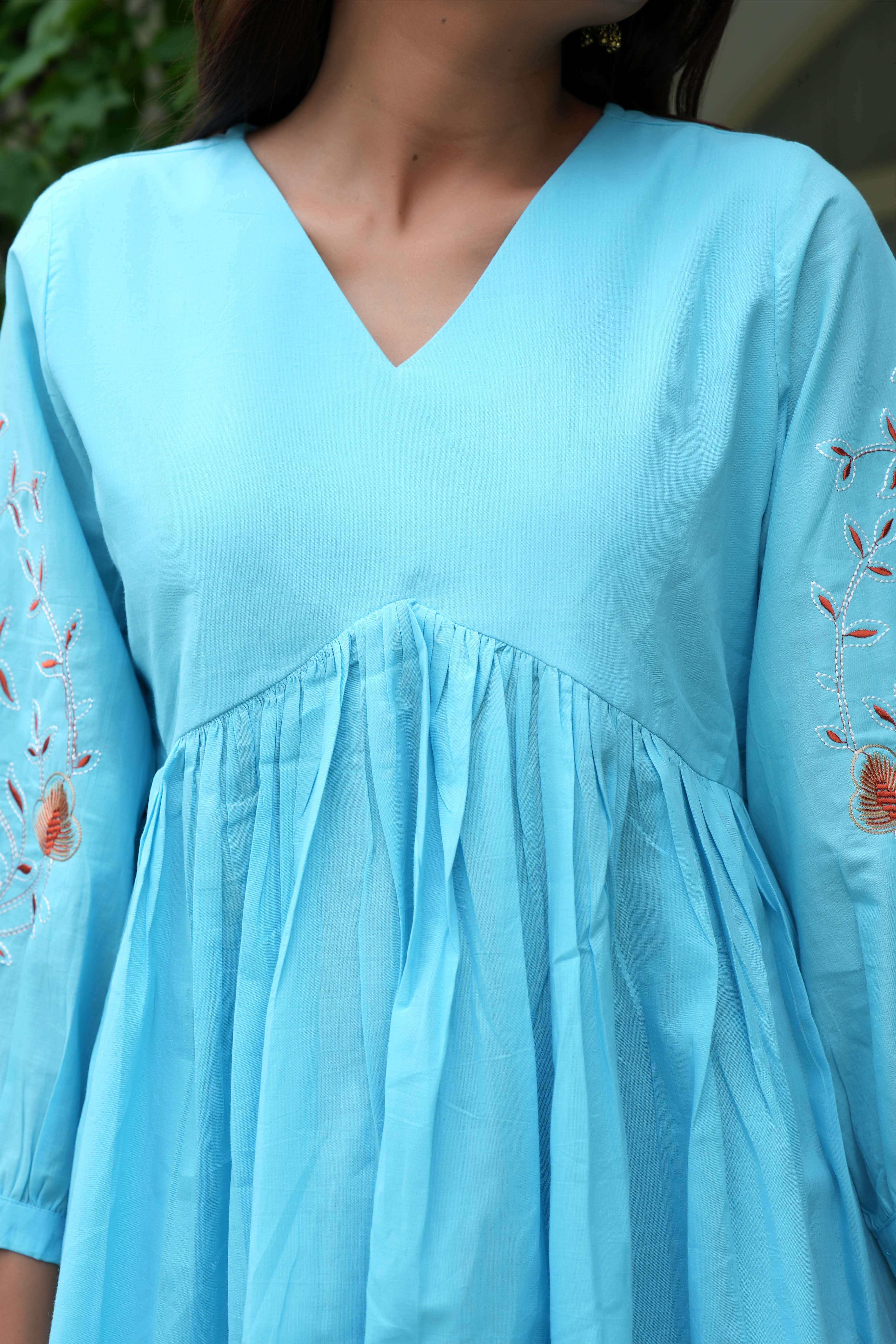 Breezy Sky Blue Pure Cotton Alia Cut Short Top With Intricate Floral Embroidery