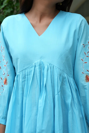 Breezy Sky Blue Pure Cotton Alia Cut Short Top With Intricate Floral Embroidery