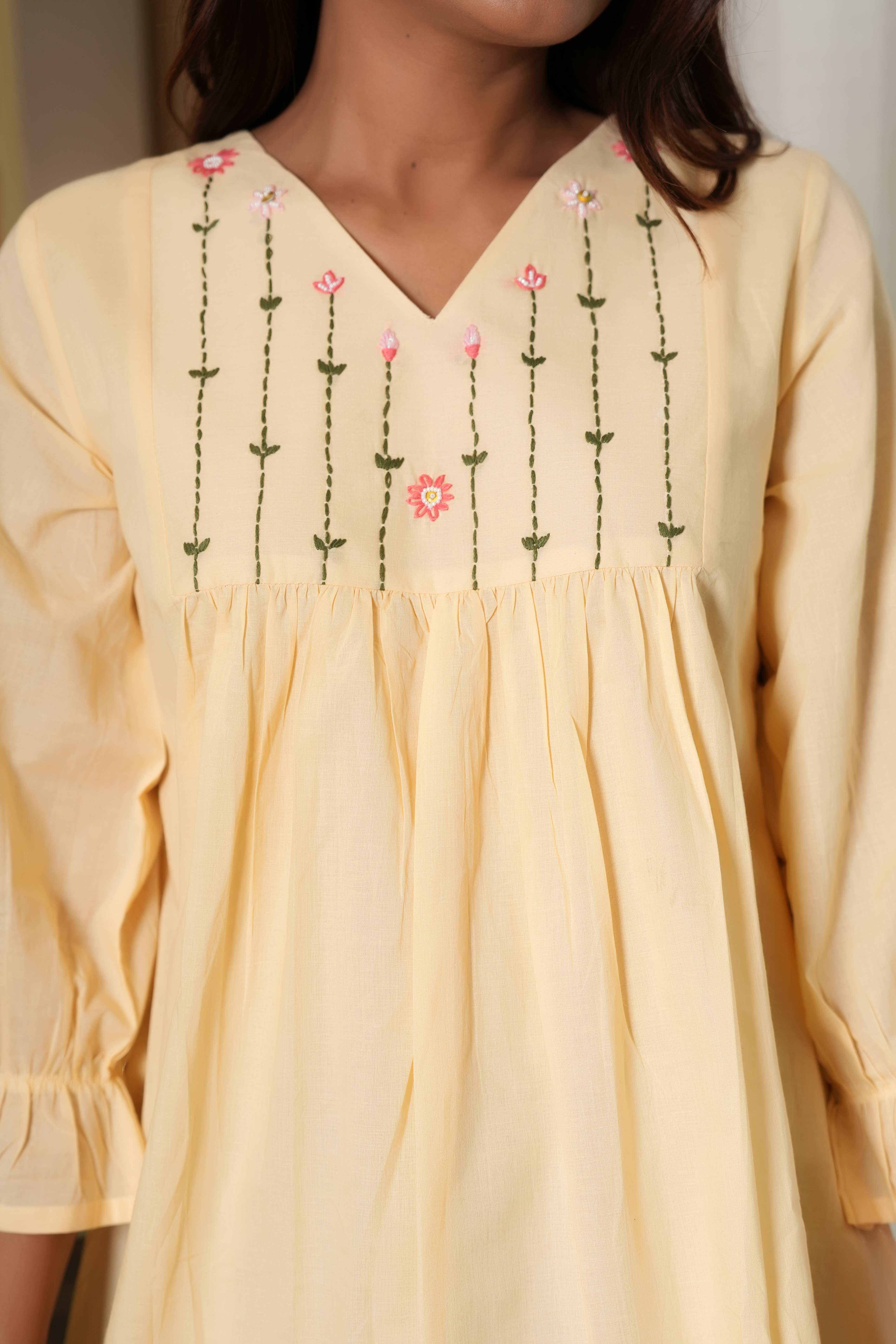 Light Peach A-Line Embroidered Tunic Top in Pure Cotton for Effortless Style