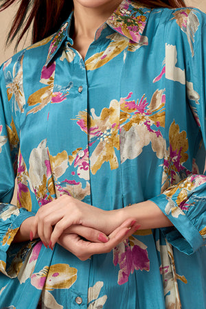 Turquoise Floral Printed Muslin Dress with a Flattering A-Line Silhouette