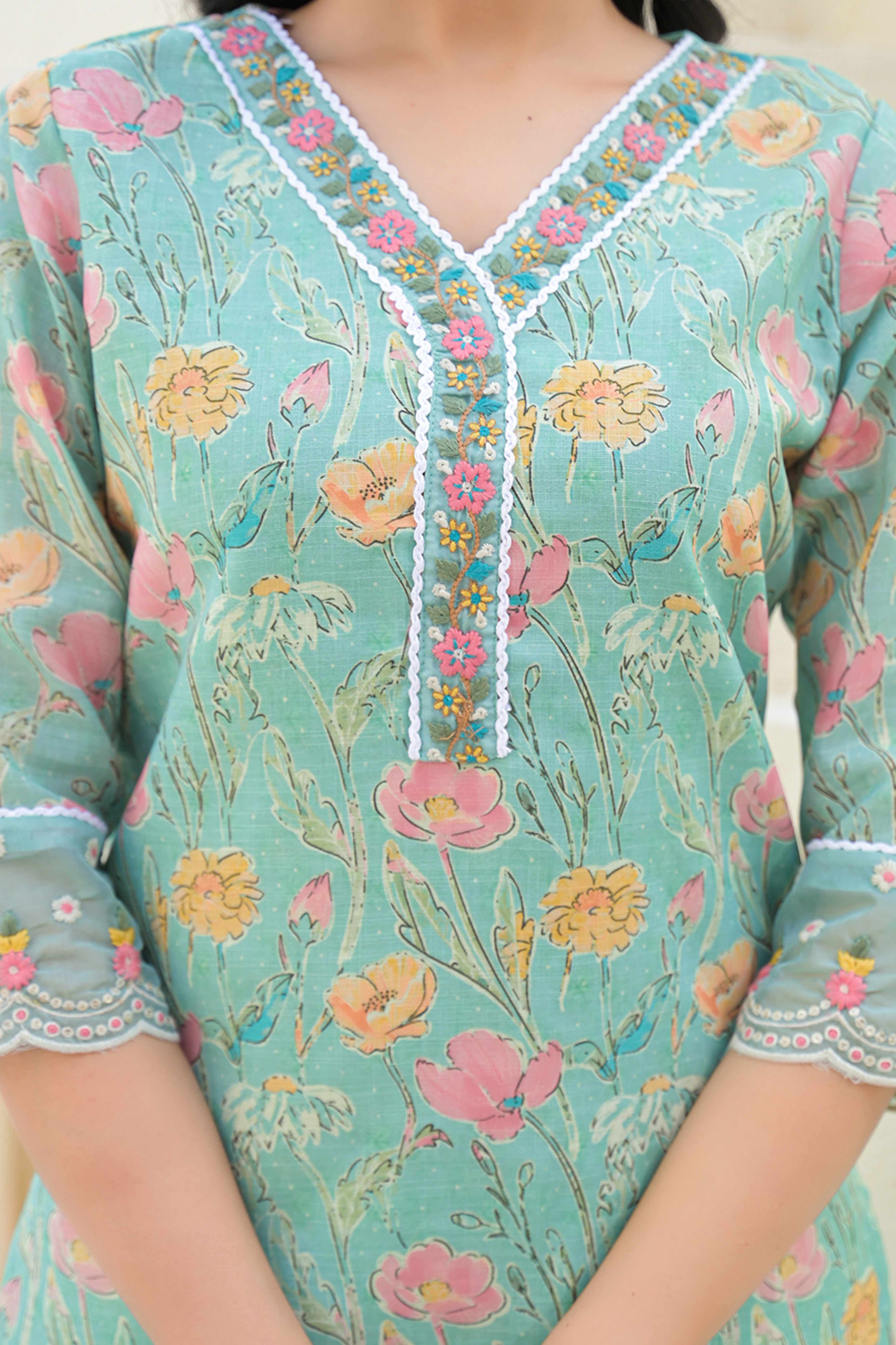 Sea Green Linen Straight Suit Featuring Printed Florals & Delicate Embroidery