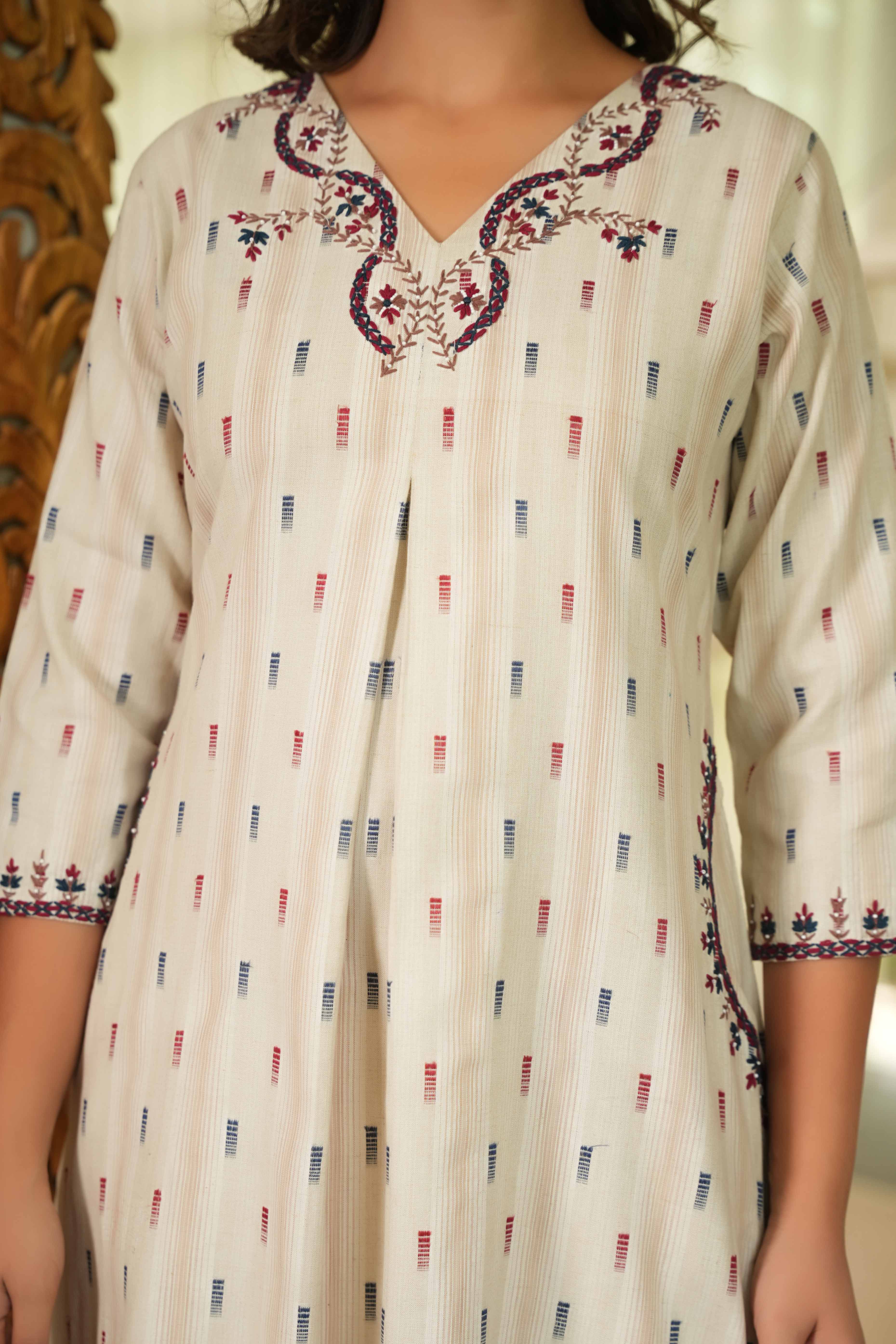 Chic Beige A-Line Pure Cotton Woven Kurti Highlighted with Embroidered Neckline