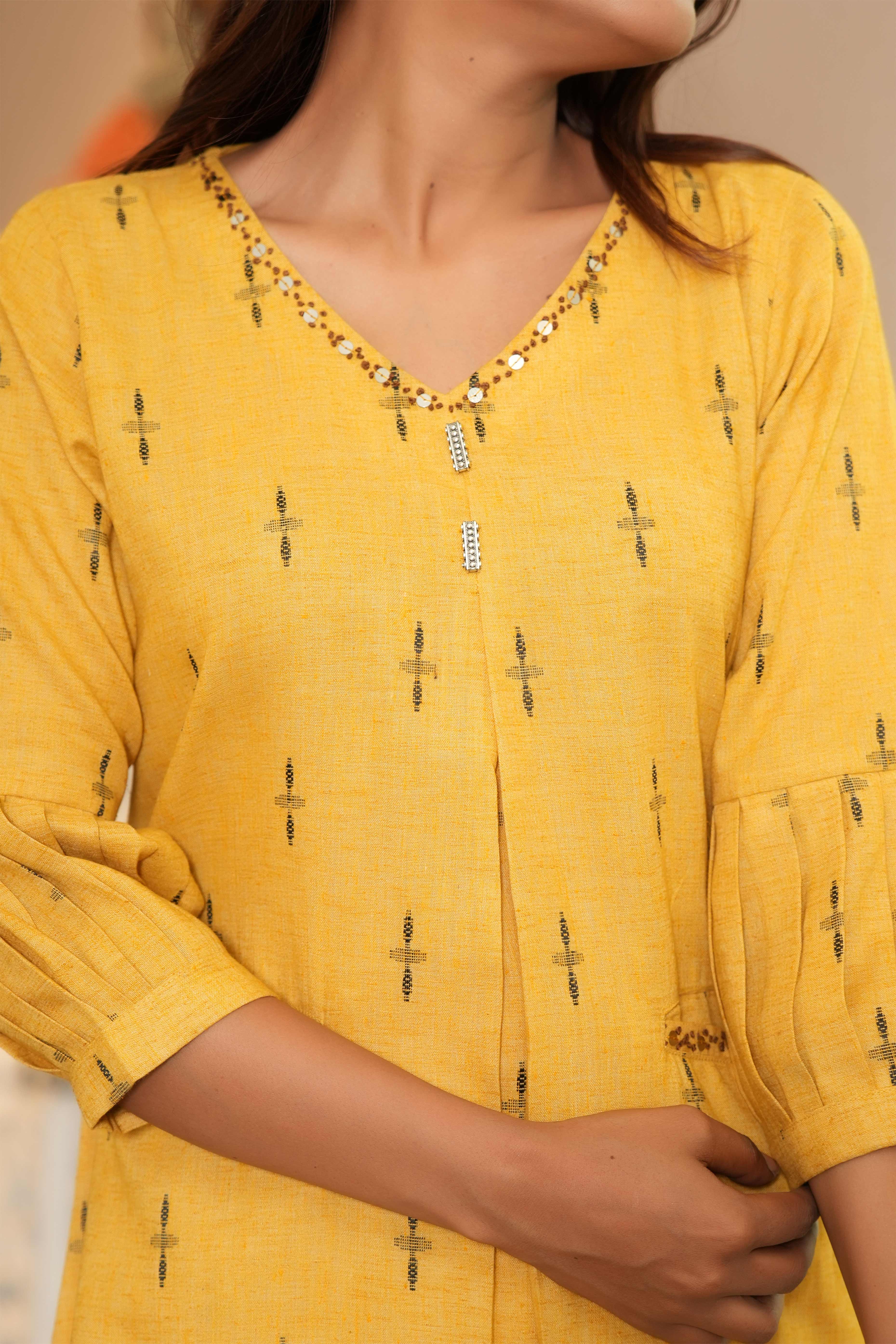 Yellow Pure Cotton A-Line Kurti with Elegant Weaving and Beads Work