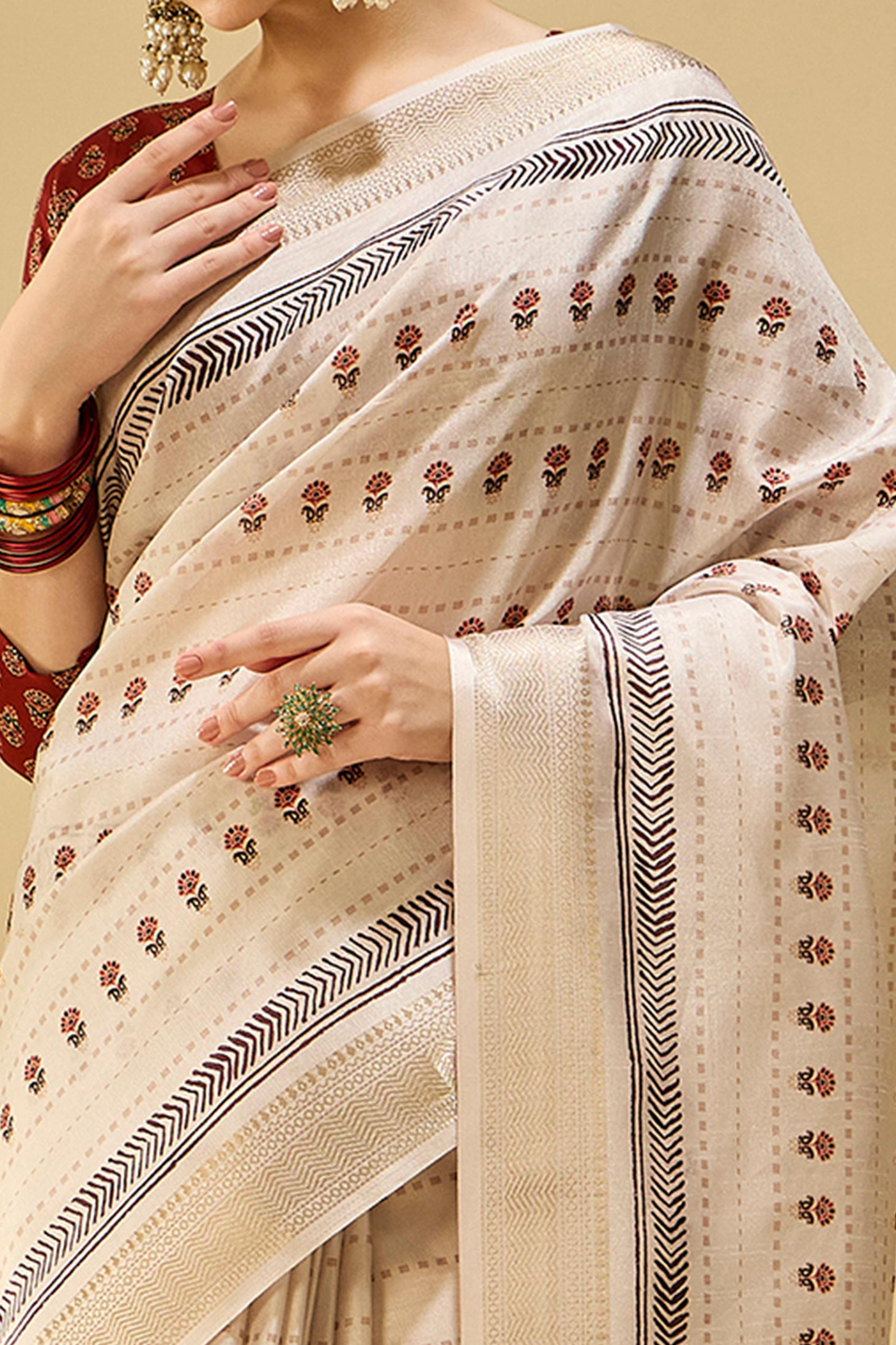 Timeless Cream Katki Cotton Silk Saree With Blooming Floral Prints & Tassel Draped Pallu