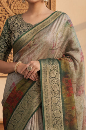 Elegant Green & Brown Floral Viscose Saree Highlighted With Intricate Weaving Border & Tassel Pallu