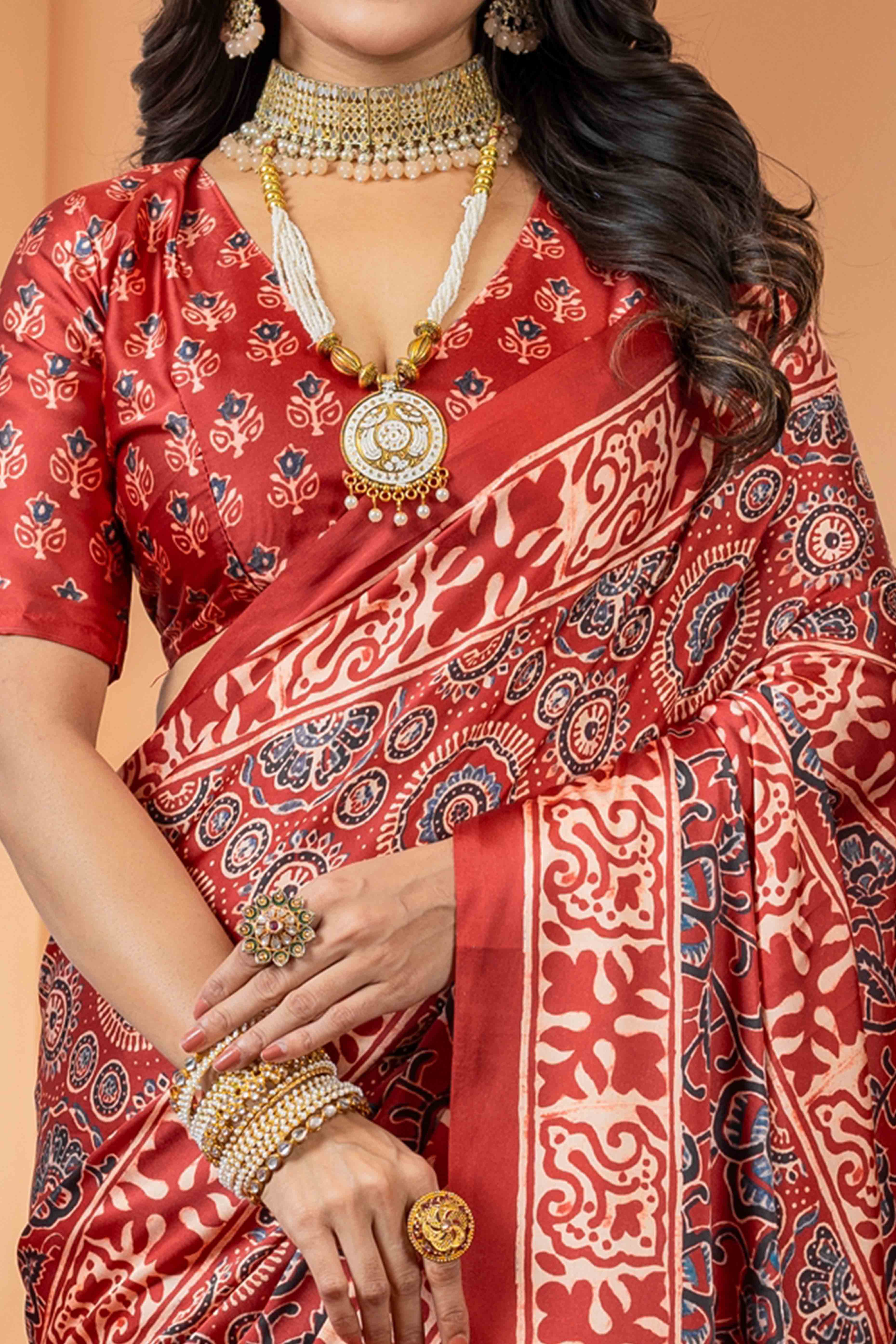 Elegant Red Satin Saree with Floral Patterns