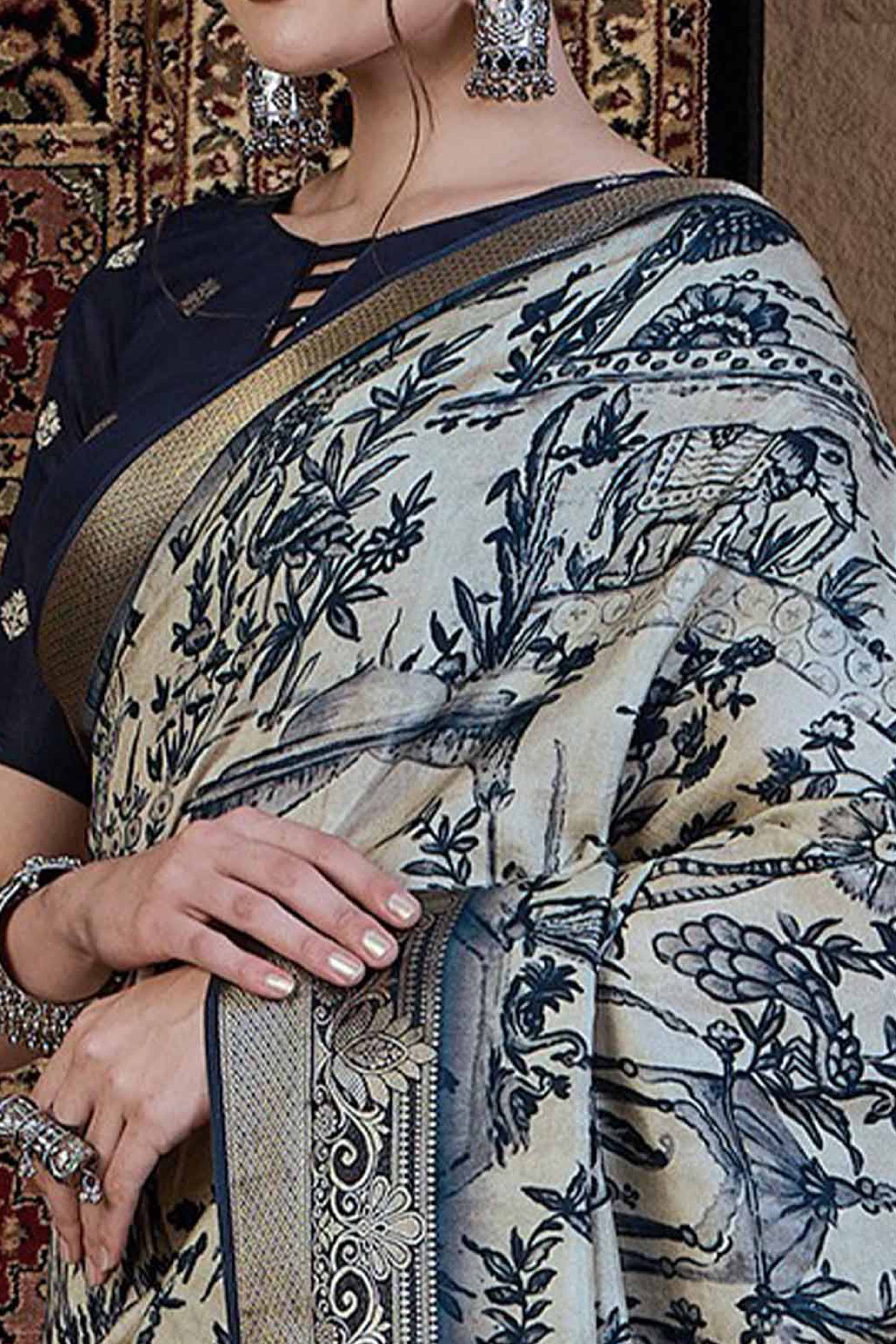 Off White Viscose Saree Featuring Delicate Floral Prints and a Rich Zari Border