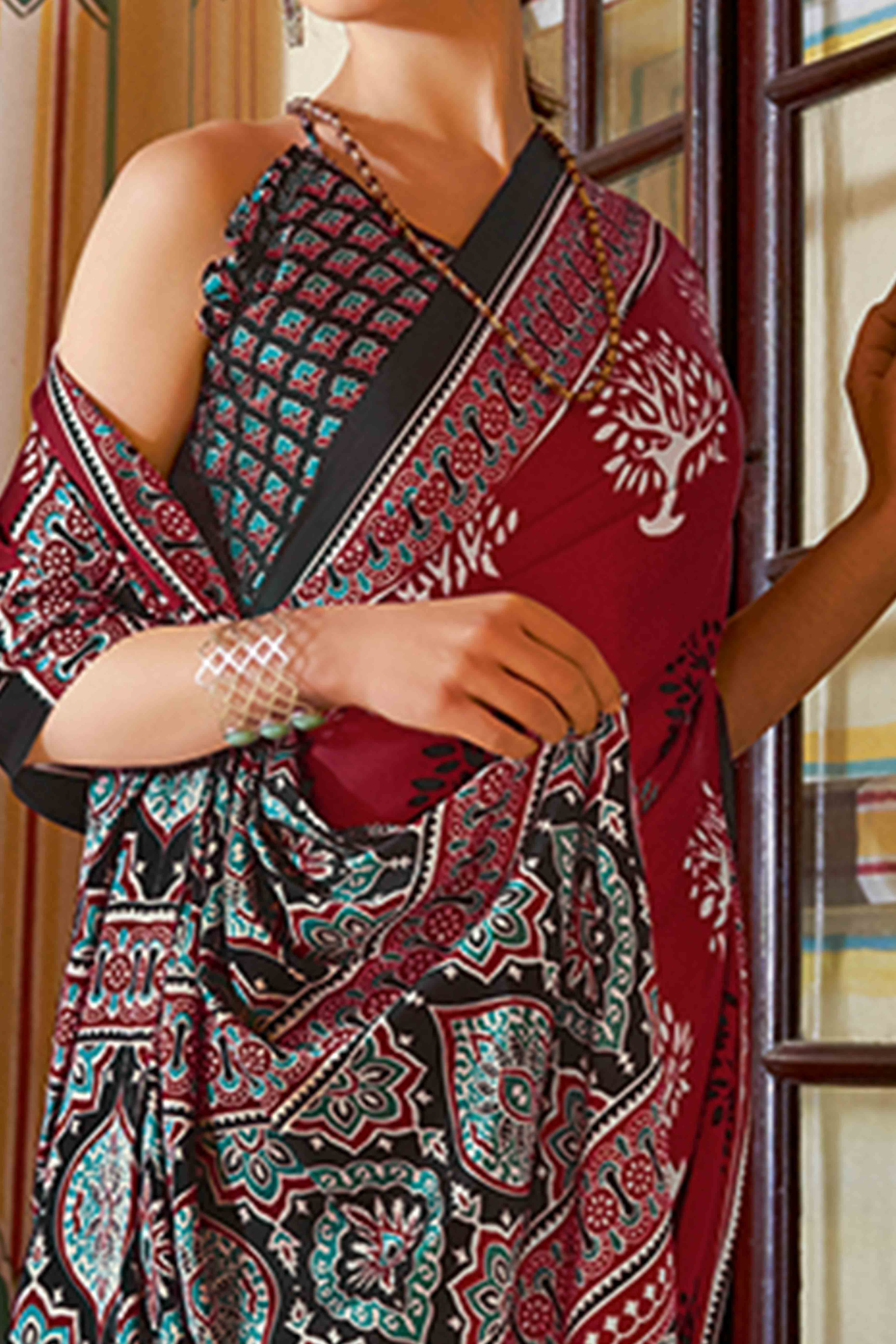 Maroon Floral Ajrakh Printed Satin Saree With Tassels