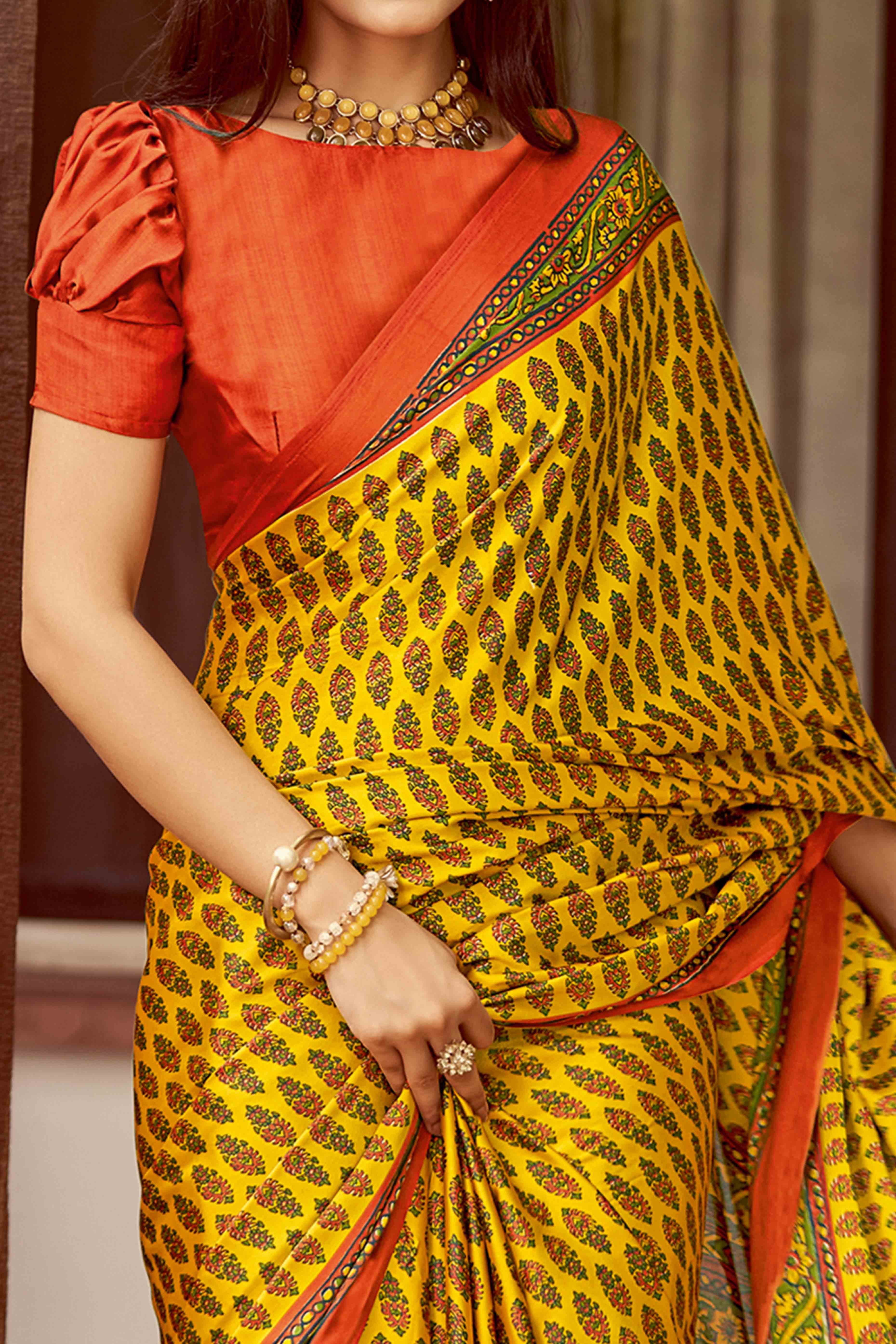 Yellow & Orange Floral Ajrakh Printed Satin Saree With Tassels