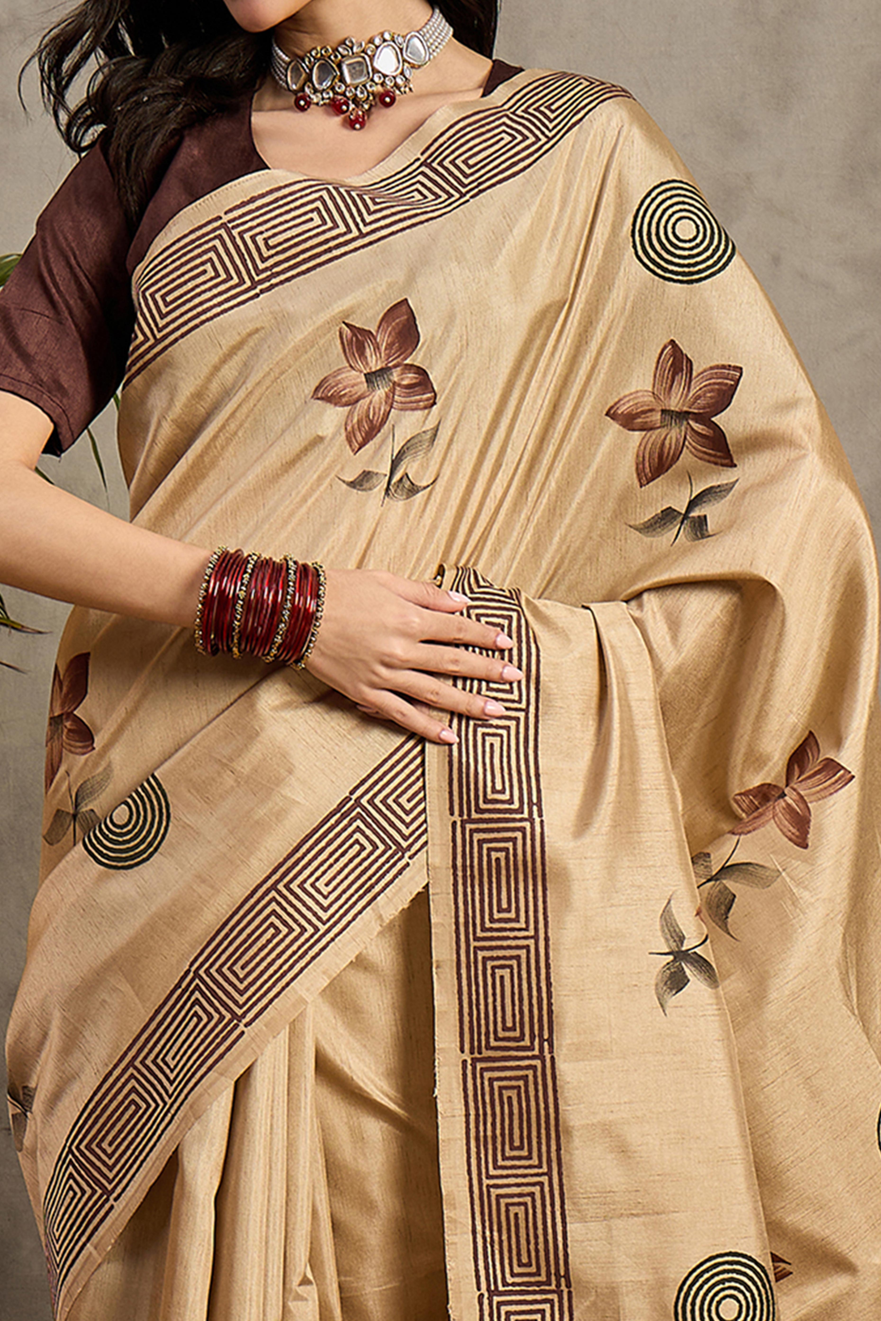 Refined Beige Floral Print Kozi Cotton Silk Saree Highlighted With Tassel Pallu