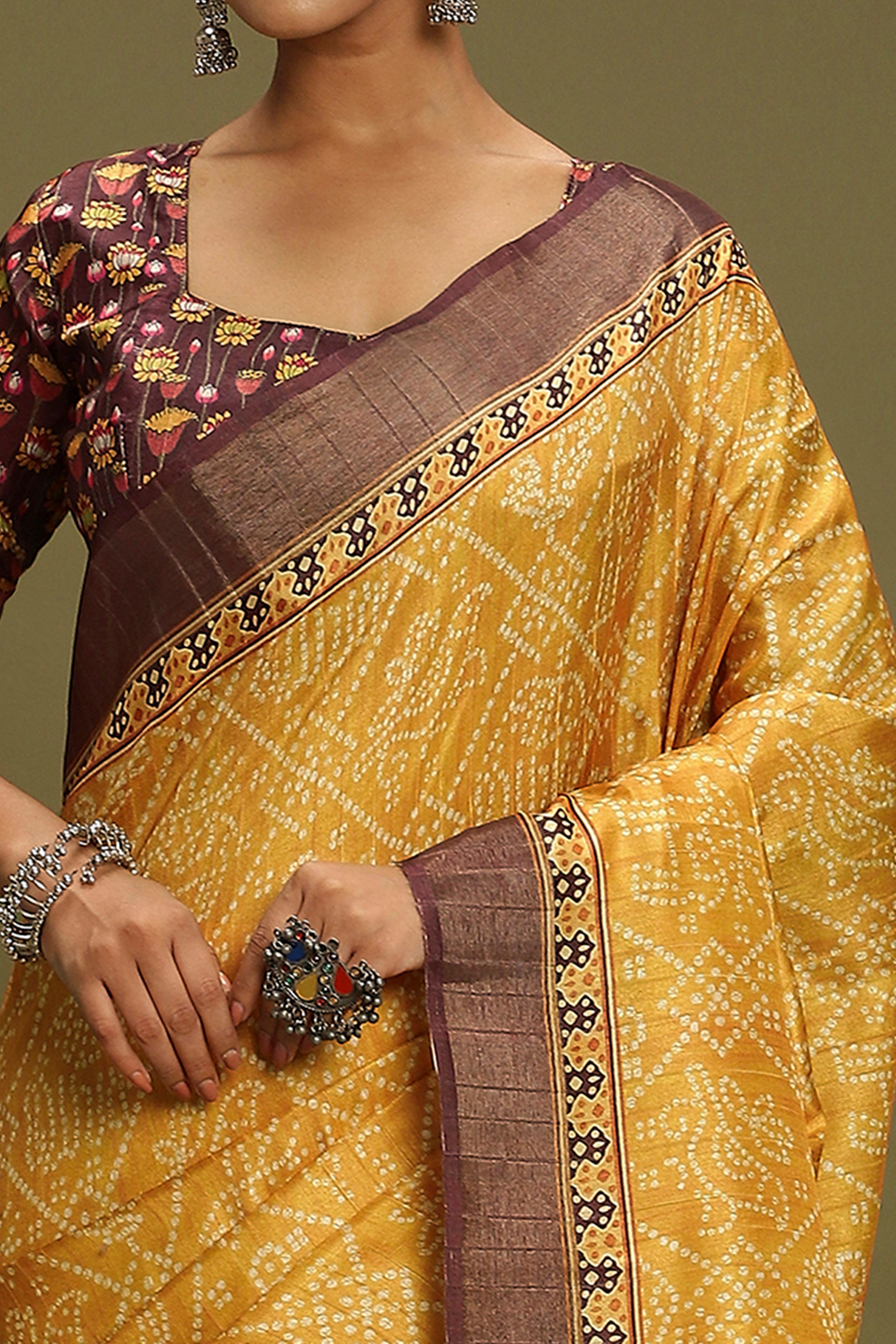 Yellow Silk Blend Saree Decorated with Vibrant Bandhani Prints and Festive Detailing