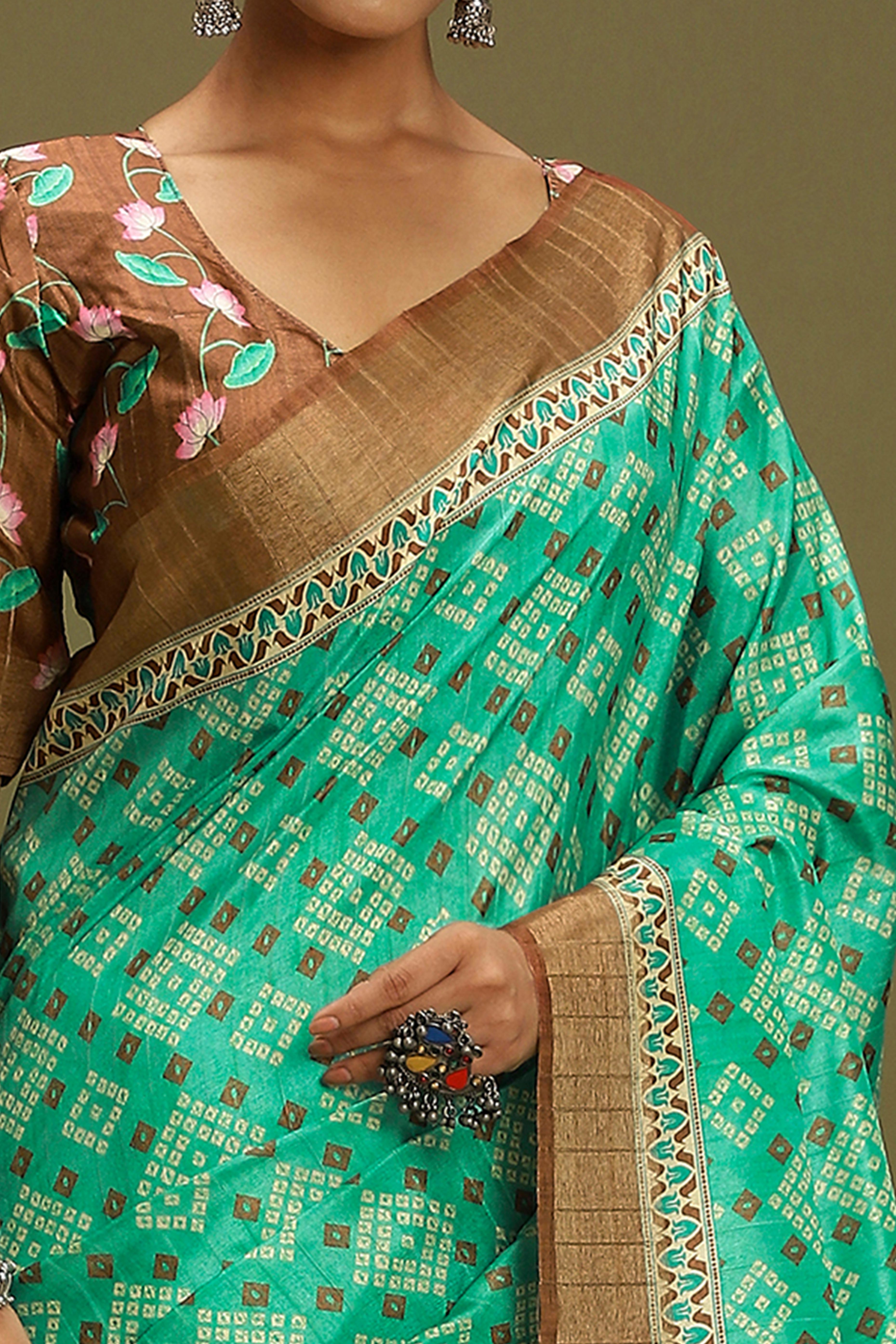 Rama Green Silk Blend Saree Decorated with Vibrant Bandhani Prints and Festive Detailing