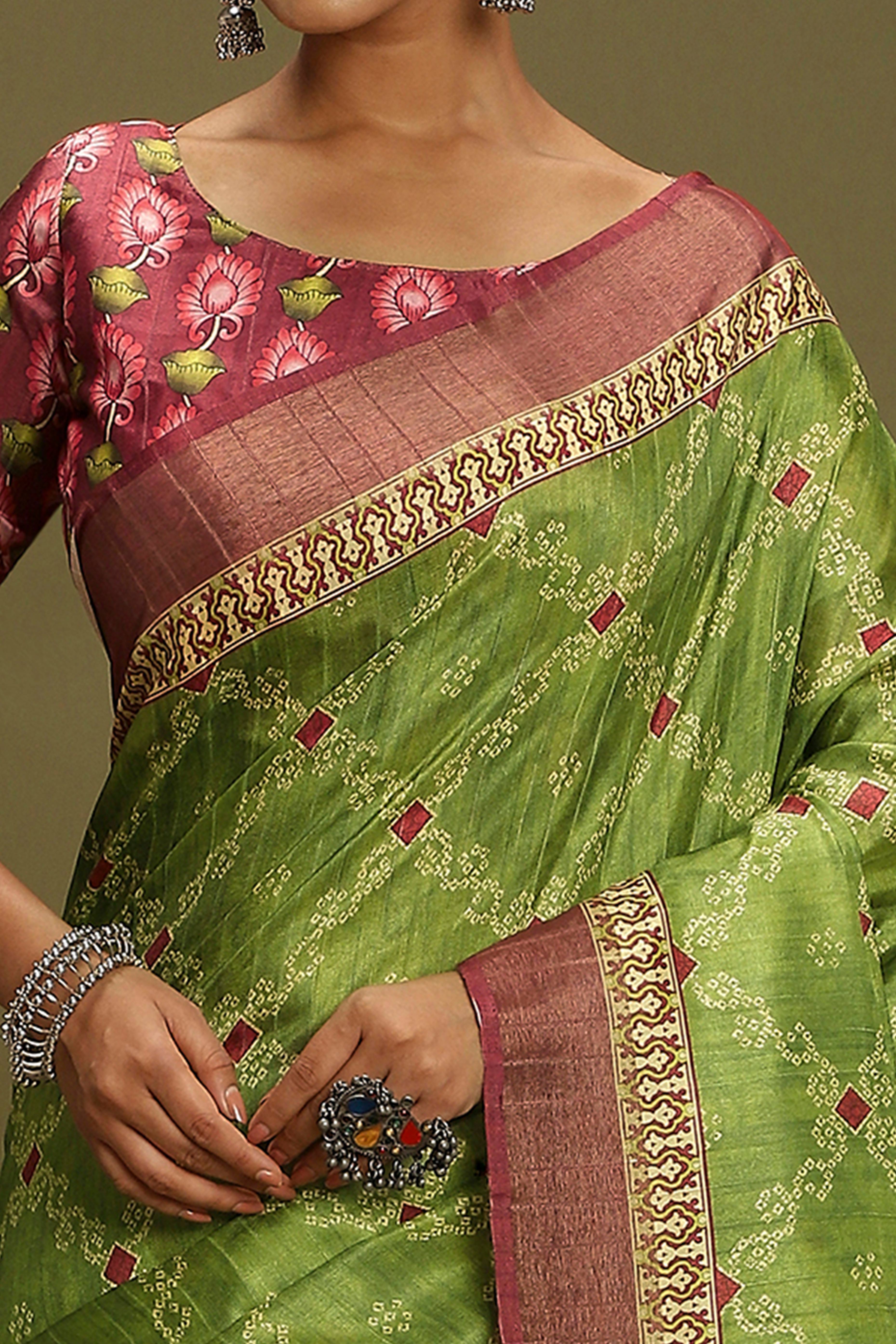 Green Silk Blend Saree Decorated with Vibrant Bandhani Prints and Festive Detailing