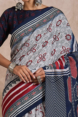 White Dola Silk Saree Featuring Heritage Ajrakh Prints for Celebratory Occasions