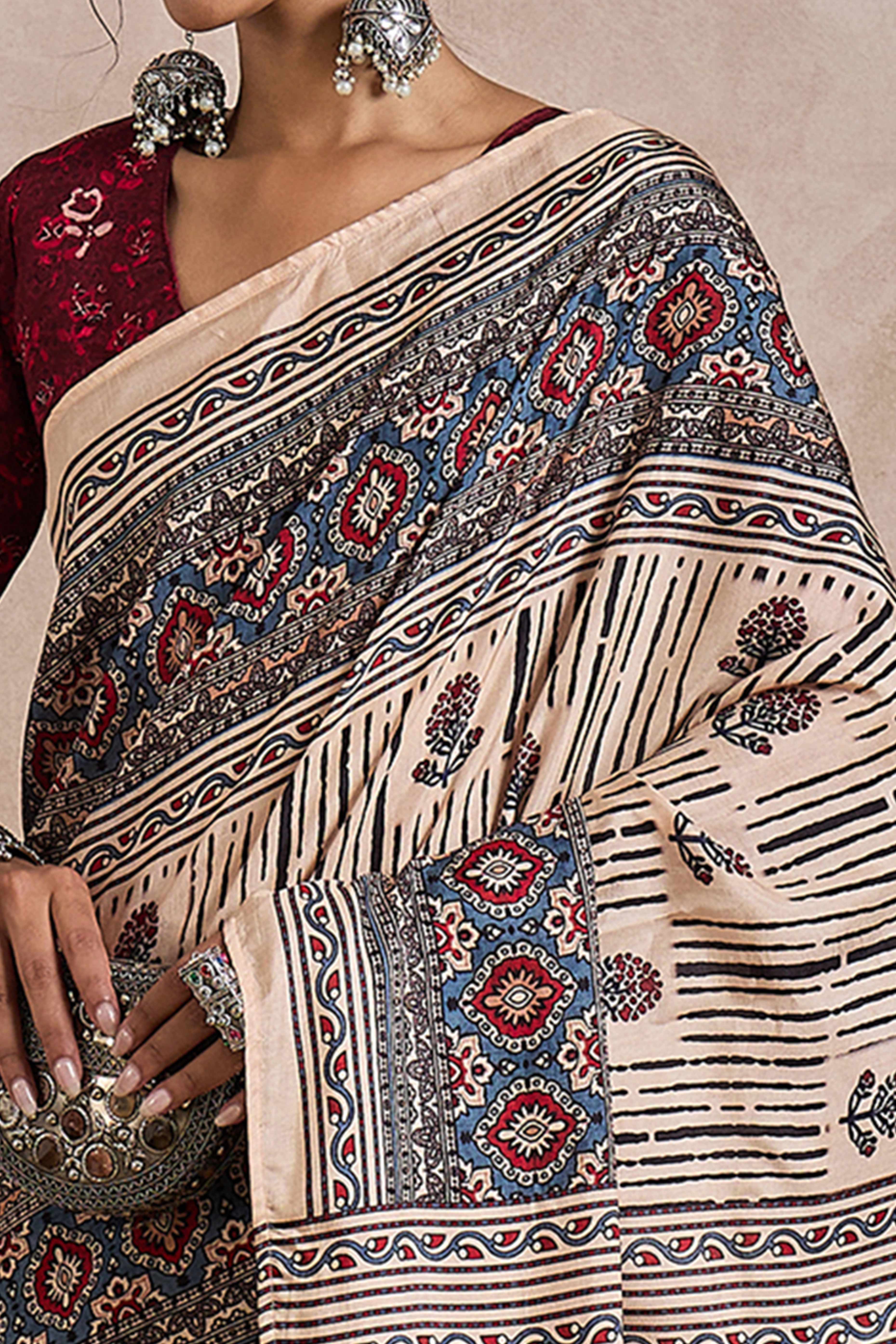Cream Dola Silk Saree Featuring Heritage Ajrakh Prints for Celebratory Occasions