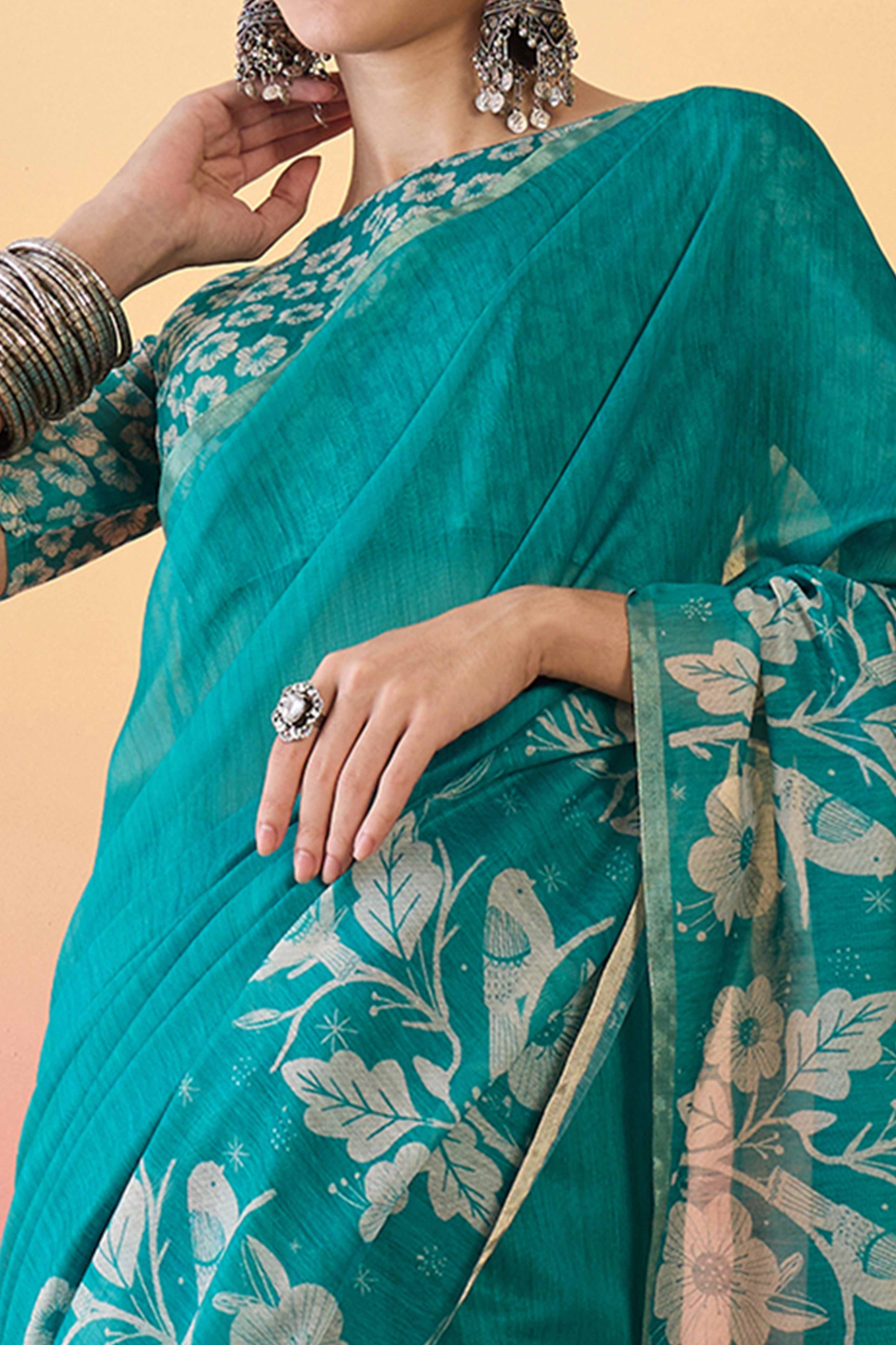 Turquoise Linen Cotton Saree Featuring Elegant Floral & Bird Prints With Tassel Pallu