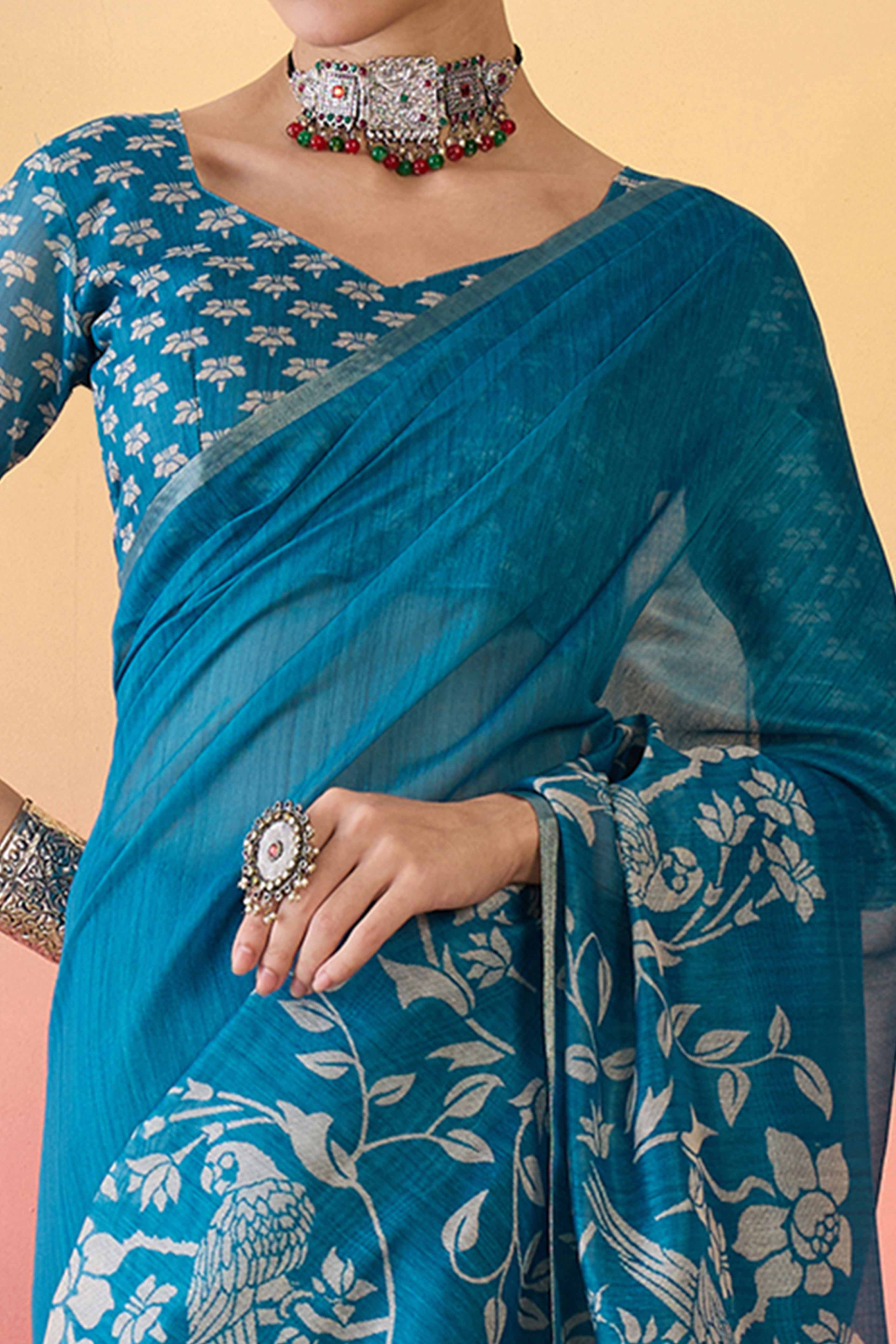 Blue Linen Cotton Saree Featuring Elegant Floral & Bird Prints With Tassel Pallu
