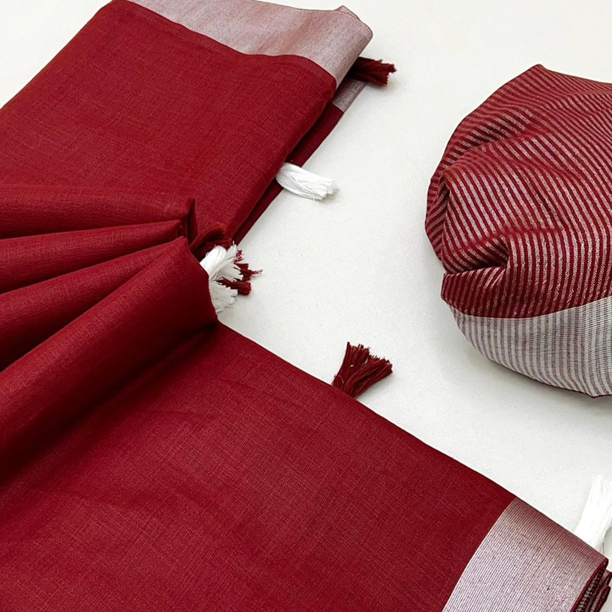 Maroon Solid Pure Linen Saree With Zari Woven Border