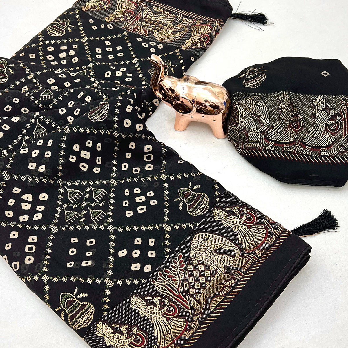 Elegant Black Bandhani Foil Printed Georgette Saree Highlighted With Soft Tassel Pallu