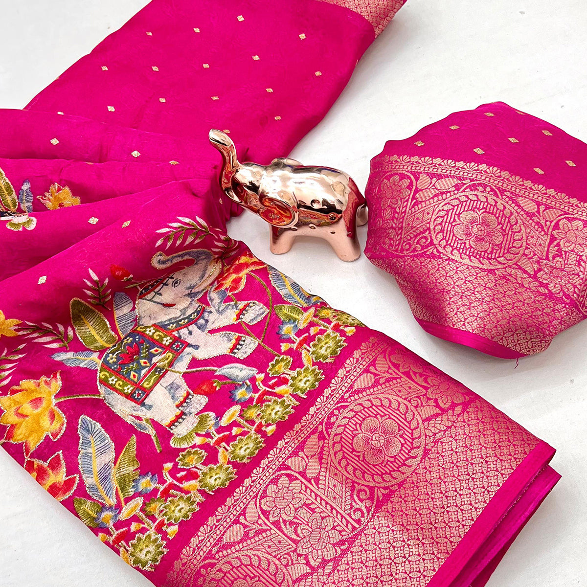 Elegant Pink Elephant & Floral Printed Georgette Saree Accented With Gleaming Weaving Zari Border