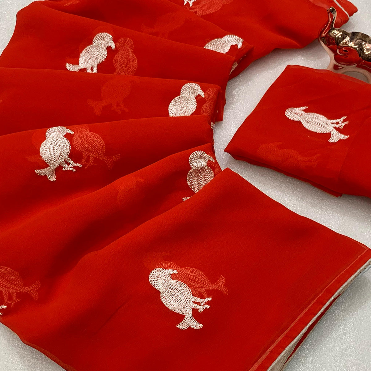 Red Georgette Saree Adorned With Elegant Bird Embroidery