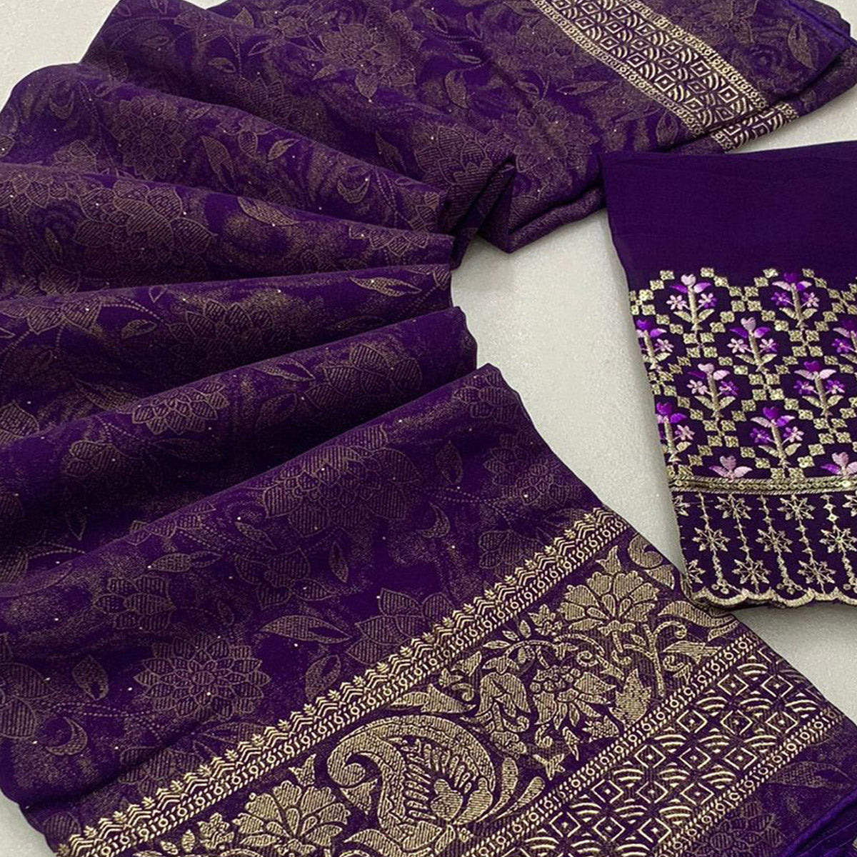 Purple Floral Foil Printed Georgette Saree With Tassels
