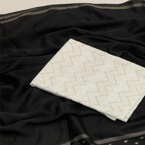 Black Woven Georgette Saree With Tassels